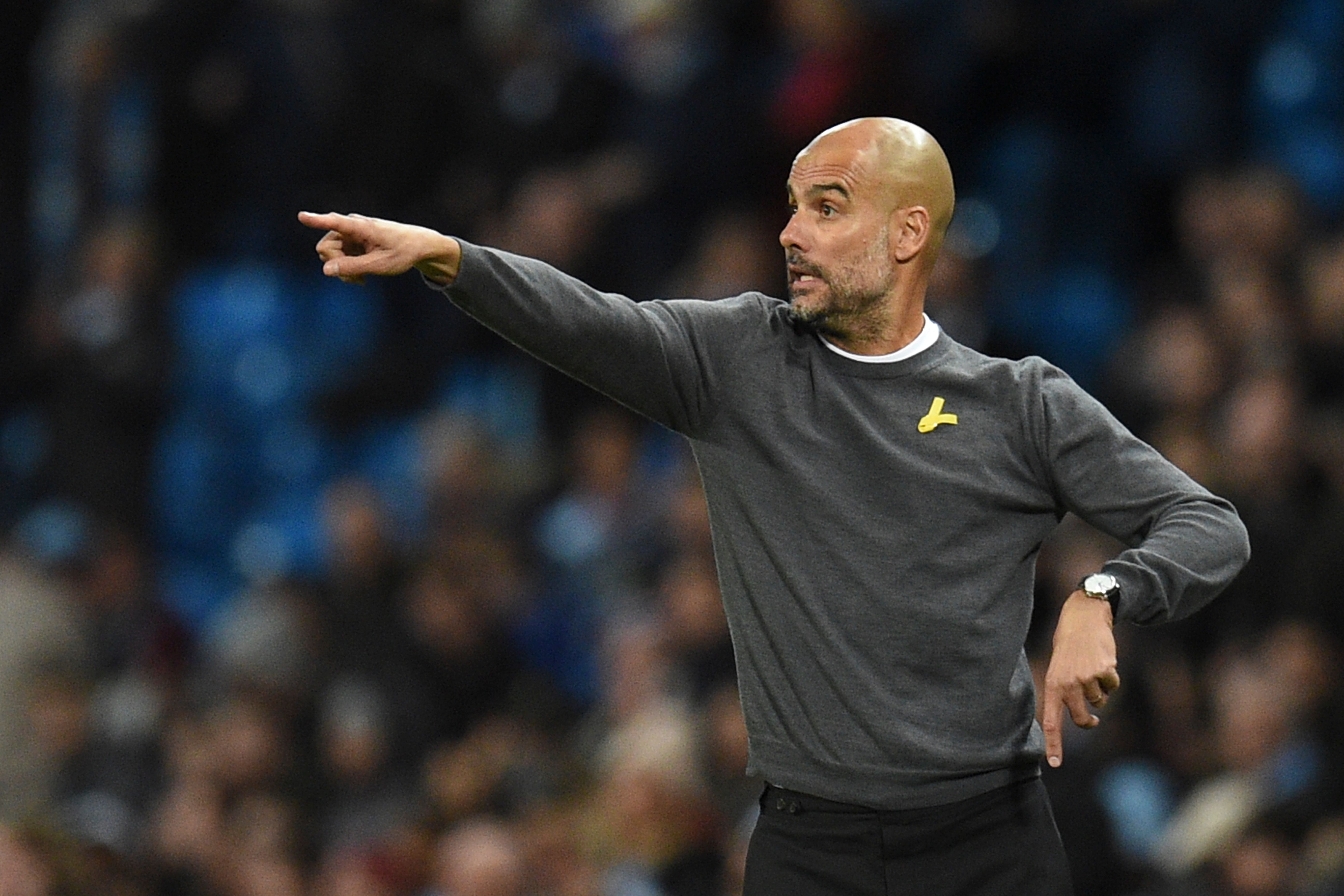 Manchester City's Spanish manager Pep Guardiola reacts on the touchline during the UEFA Champions League Group F football match between Manchester City and Feyenoord at the Etihad Stadium in Manchester, north west England, on November 21, 2017. / AFP PHOTO / Oli SCARFF        (Photo credit should read OLI SCARFF/AFP/Getty Images)