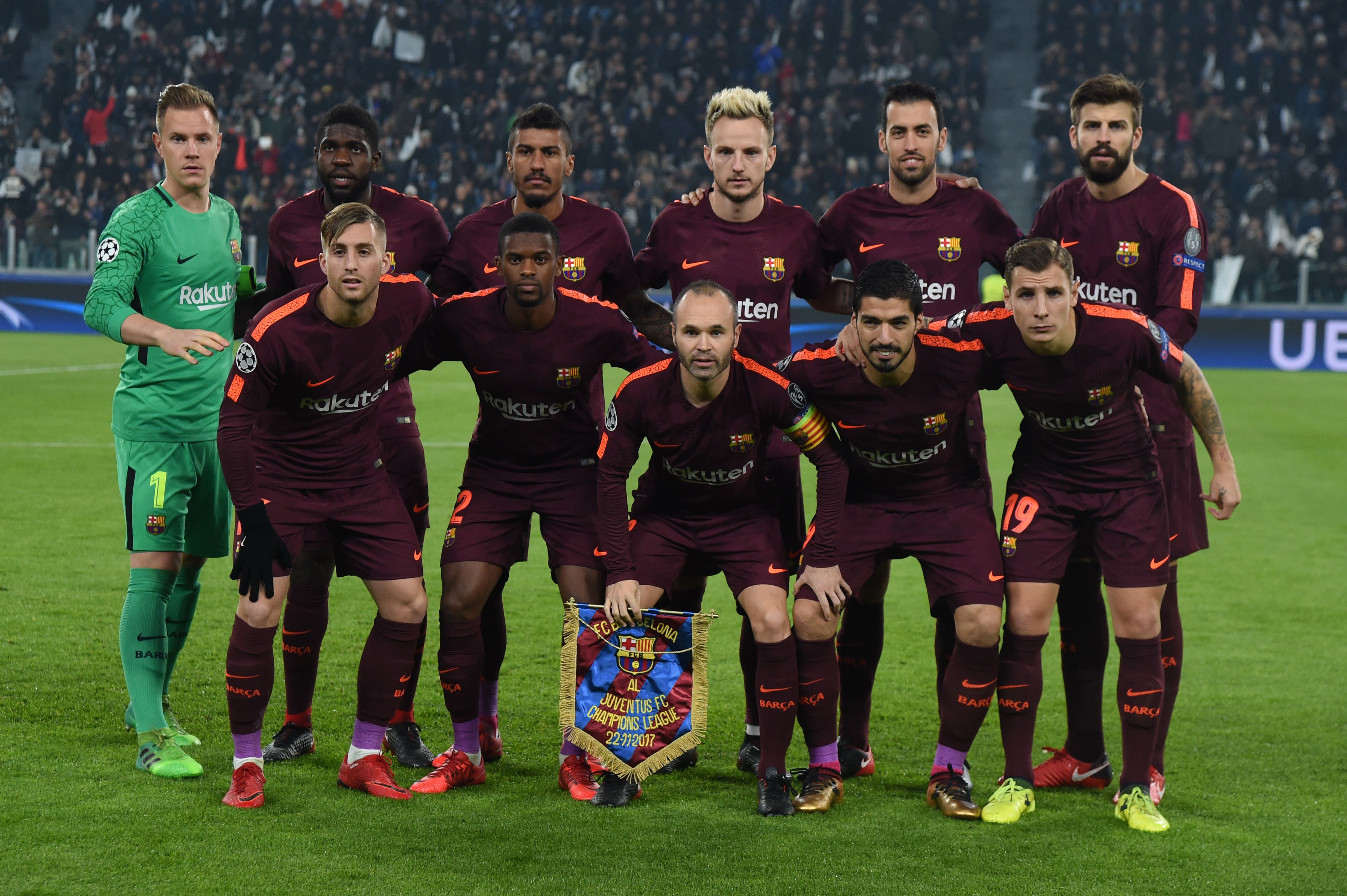 Barcelona's team players (from top left) Barcelona's German goalkeeper Marc-Andre Ter Stegen, Barcelona's French defender Samuel Umtiti, Barcelona's Brazilian midfielder Paulinho, Barcelona's Croatian midfielder Ivan Rakitic, Barcelona's Spanish midfielder Sergio Busquets, Barcelona's Spanish defender Gerard Pique, Barcelona's Spanish forward Gerard Deulofeu, Barcelona's Portuguese defender Nelson Semedo, Barcelona's Spanish midfielder Andres Iniesta, Barcelona's Uruguayan forward Luis Suarez and Barcelona's French defender Lucas Digne pose before the UEFA Champions League Group D football match Juventus Barcelona on November 22, 2017 at the Juventus stadium in Turin.  / AFP PHOTO / Filippo MONTEFORTE        (Photo credit should read FILIPPO MONTEFORTE/AFP/Getty Images)