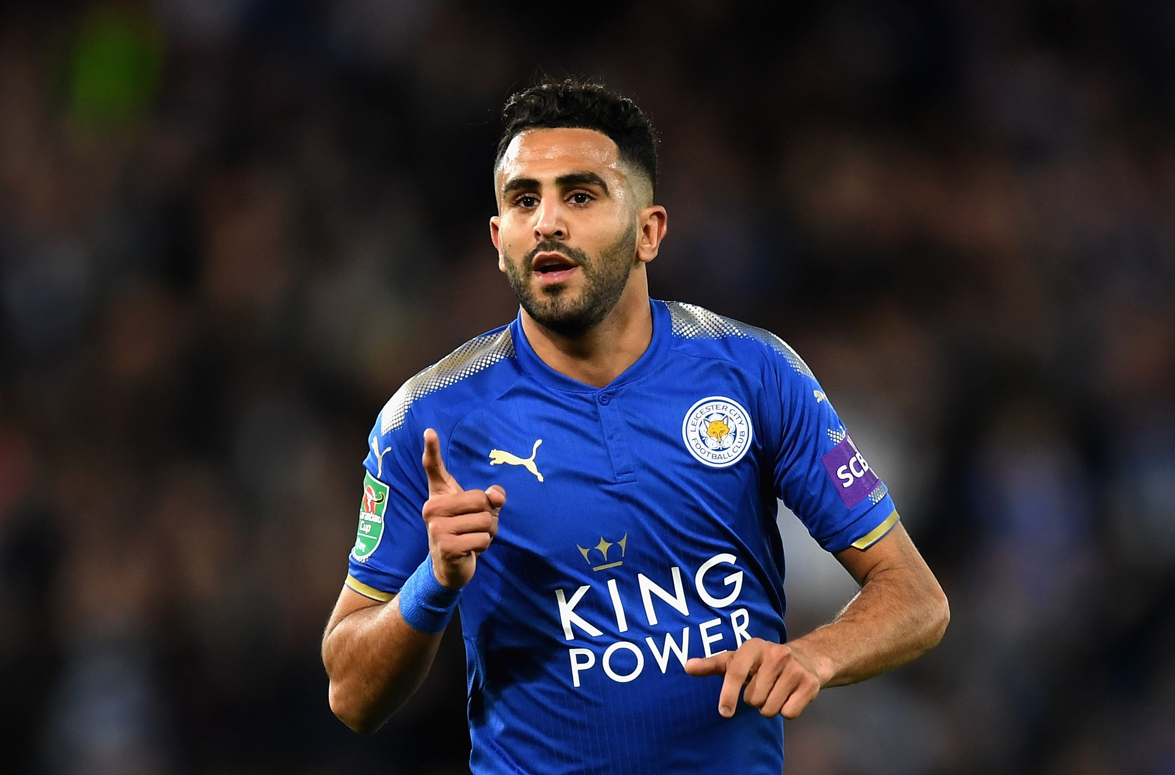 LEICESTER, ENGLAND - OCTOBER 24:  Riyad Mahrez of Leicester City celebrates scoring his sides third goal during the Caraboa Cup Fourth Round match between Leicester City and Leeds United at The King Power Stadium on October 24, 2017 in Leicester, England.  (Photo by Michael Regan/Getty Images)