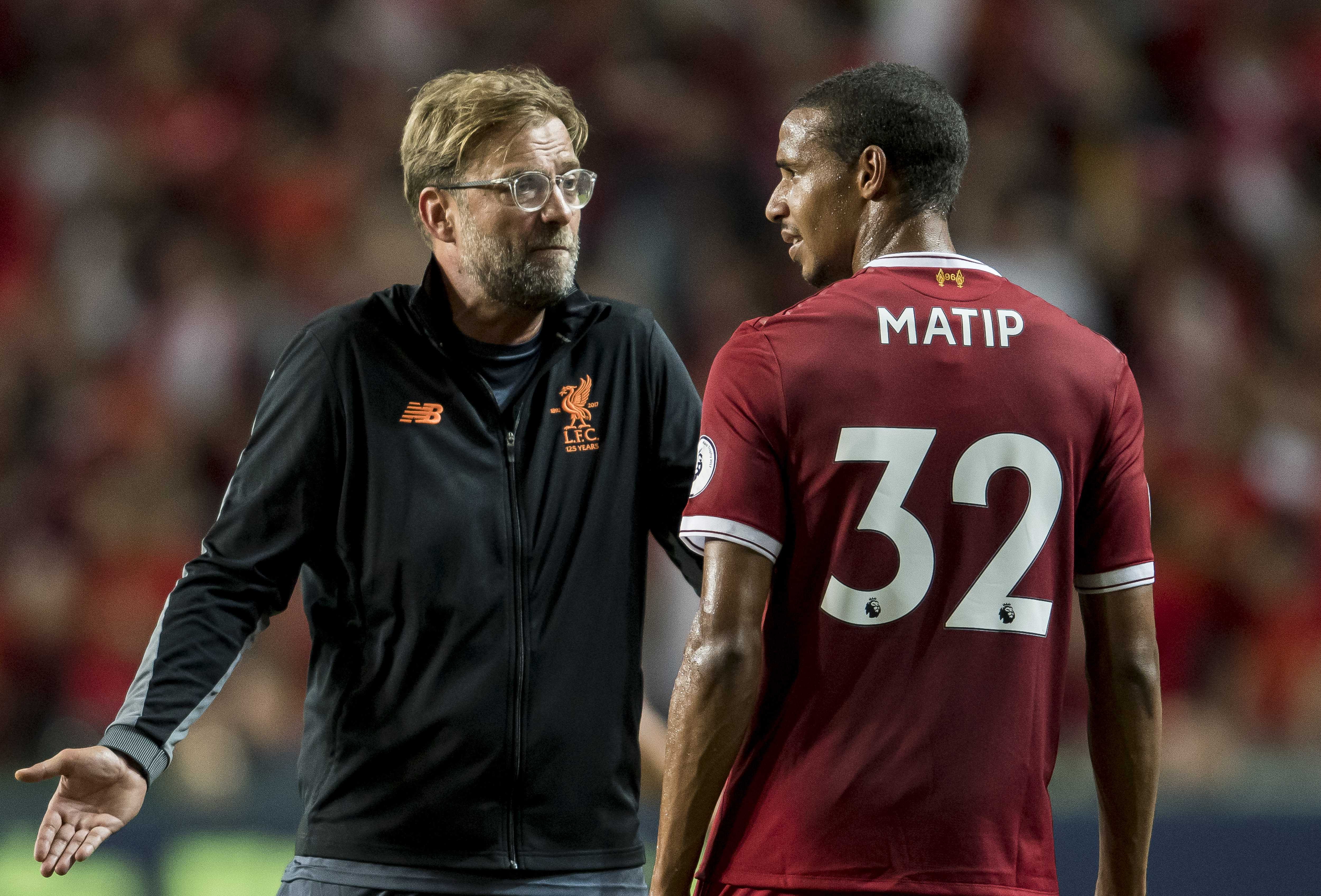 HONG KONG, HONG KONG - JULY 22: Liverpool FC Coach Jurgen Klopp (L) talks to Liverpool FC defender Joel Matip (R) during the Premier League Asia Trophy match between Liverpool FC and Leicester City FC at Hong Kong Stadium on July 22, 2017 in Hong Kong, Hong Kong. (Photo by Victor Fraile/Getty Images )