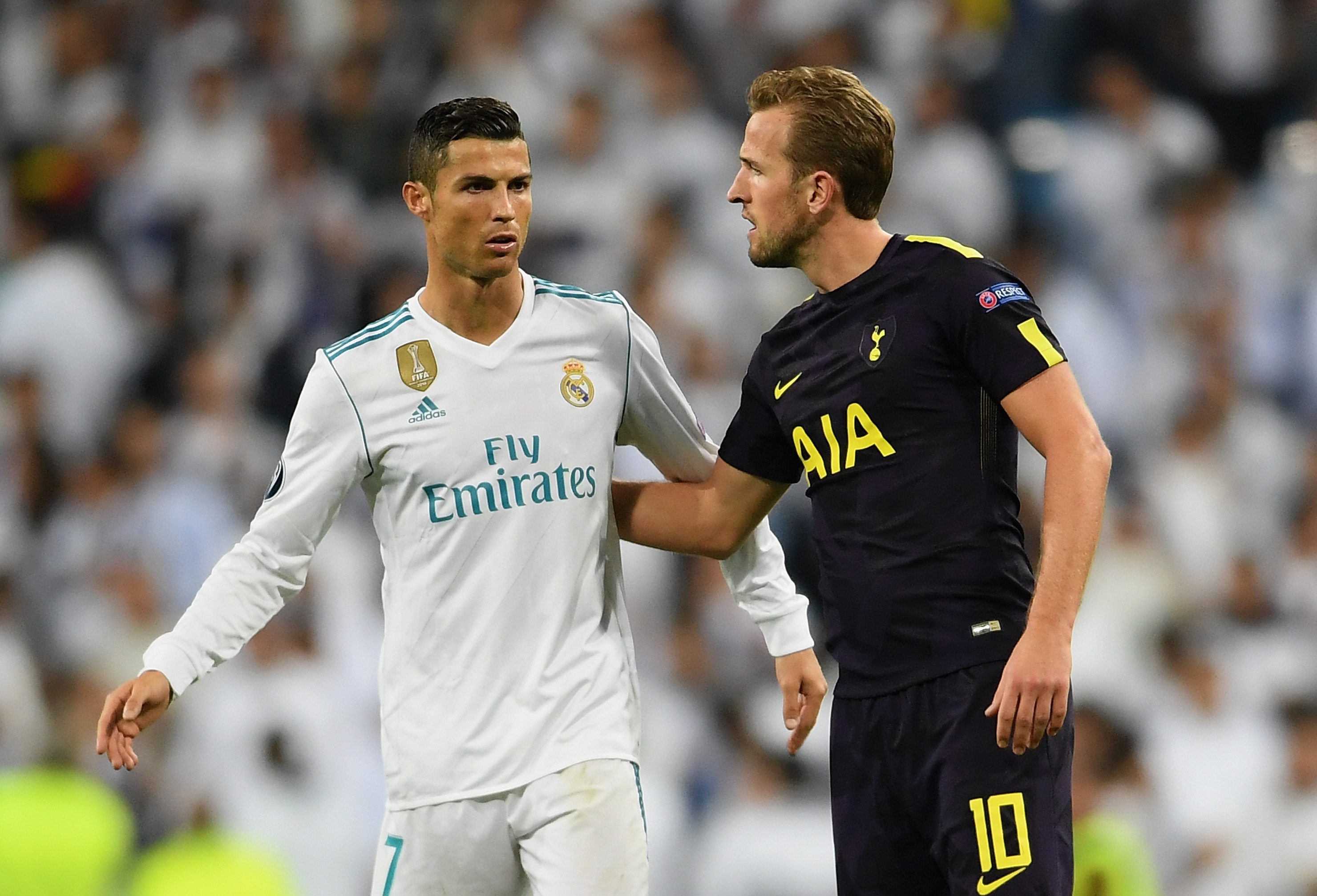 MADRID, SPAIN - OCTOBER 17:  Cristiano Ronaldo of Real Madrid and Harry Kane of Tottenham Hotspur speak after the UEFA Champions League group H match between Real Madrid and Tottenham Hotspur at Estadio Santiago Bernabeu on October 17, 2017 in Madrid, Spain.  (Photo by Laurence Griffiths/Getty Images)