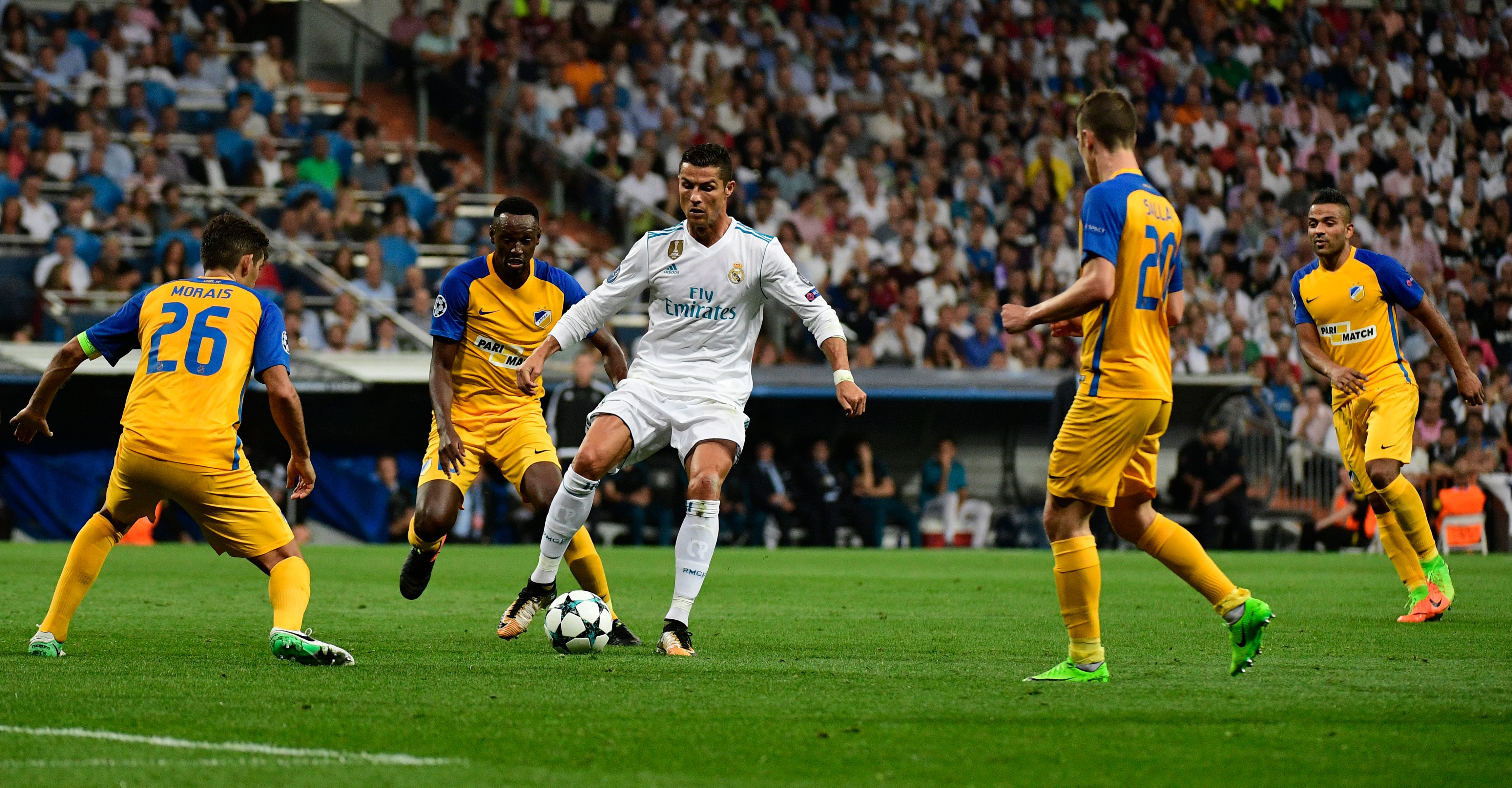 TOPSHOT - Real Madrid's forward from Portugal Cristiano Ronaldo controls the ball during the UEFA Champions League football match Real Madrid CF vs APOEL FC at the Santiago Bernabeu stadium in Madrid on September 13, 2017. / AFP PHOTO / PIERRE-PHILIPPE MARCOU        (Photo credit should read PIERRE-PHILIPPE MARCOU/AFP/Getty Images)