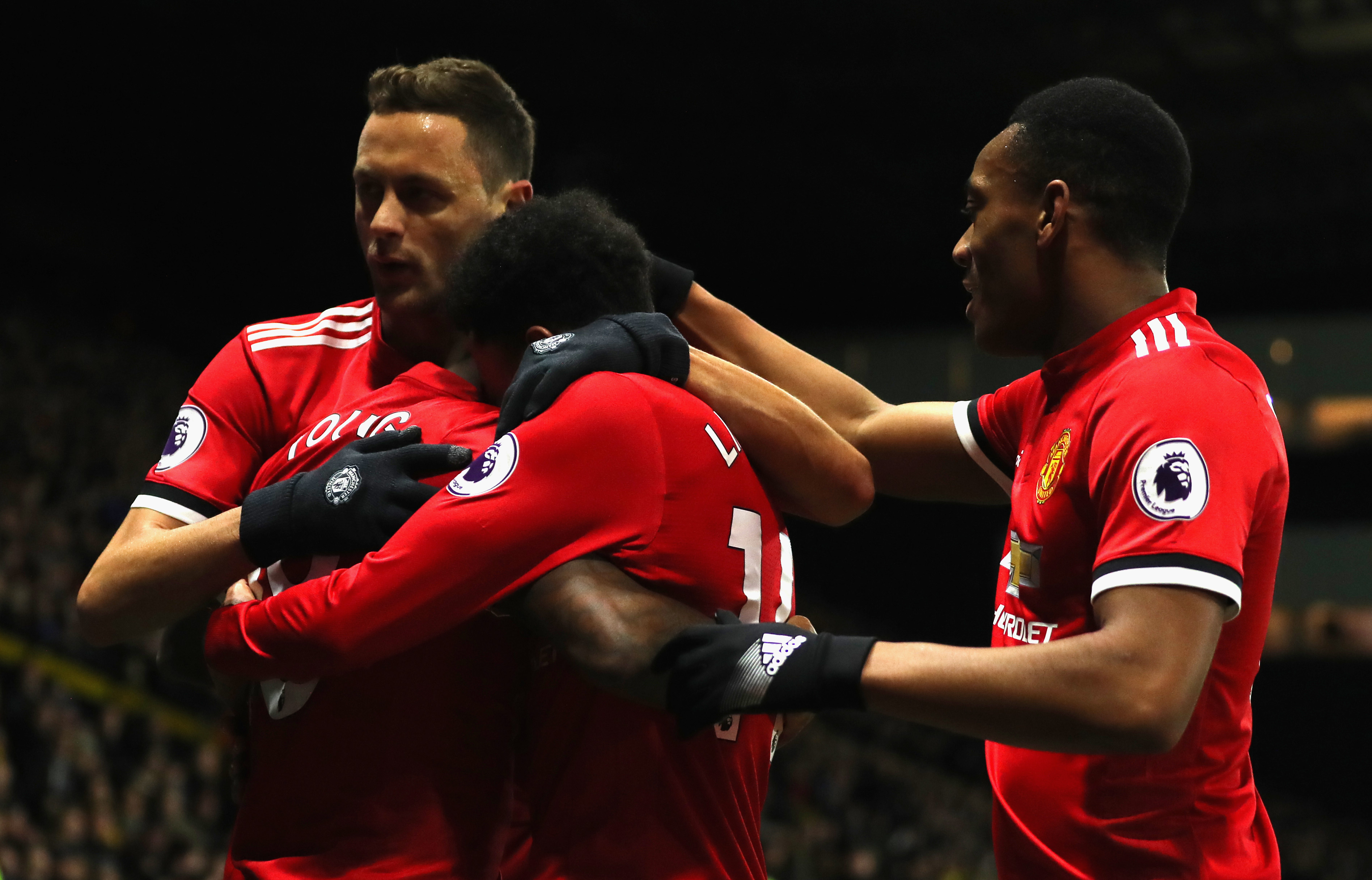 WATFORD, ENGLAND - NOVEMBER 28:  Ashley Young of Manchester United celebrates scoring the first goal with Nemanja Matic, Jesse Lingard and Anthony Martial of Manchester United during the Premier League match between Watford and Manchester United at Vicarage Road on November 28, 2017 in Watford, England.  (Photo by Richard Heathcote/Getty Images)