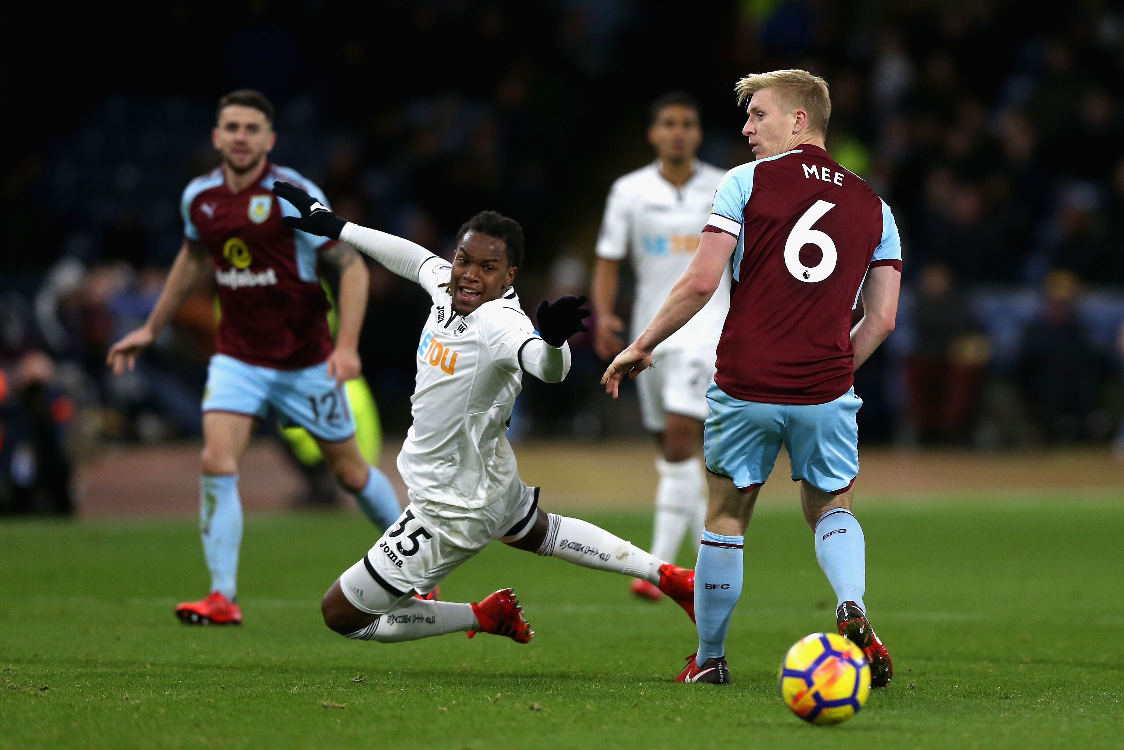 Joy against the men in white. (Photo courtesy - Nigel Roddis/Getty Images)