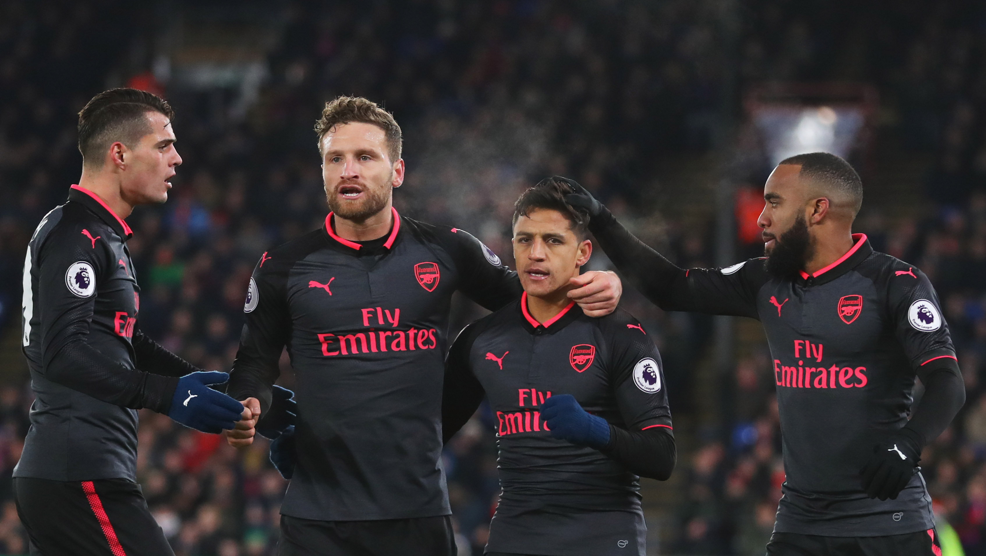 LONDON, ENGLAND - DECEMBER 28:  Alexis Sanchez of Arsenal (2R) celebrates as he scores their second goal with Granit Xhaka, Shkodran Mustafi and Alexandre Lacazette during the Premier League match between Crystal Palace and Arsenal at Selhurst Park on December 28, 2017 in London, England.  (Photo by Catherine Ivill/Getty Images)