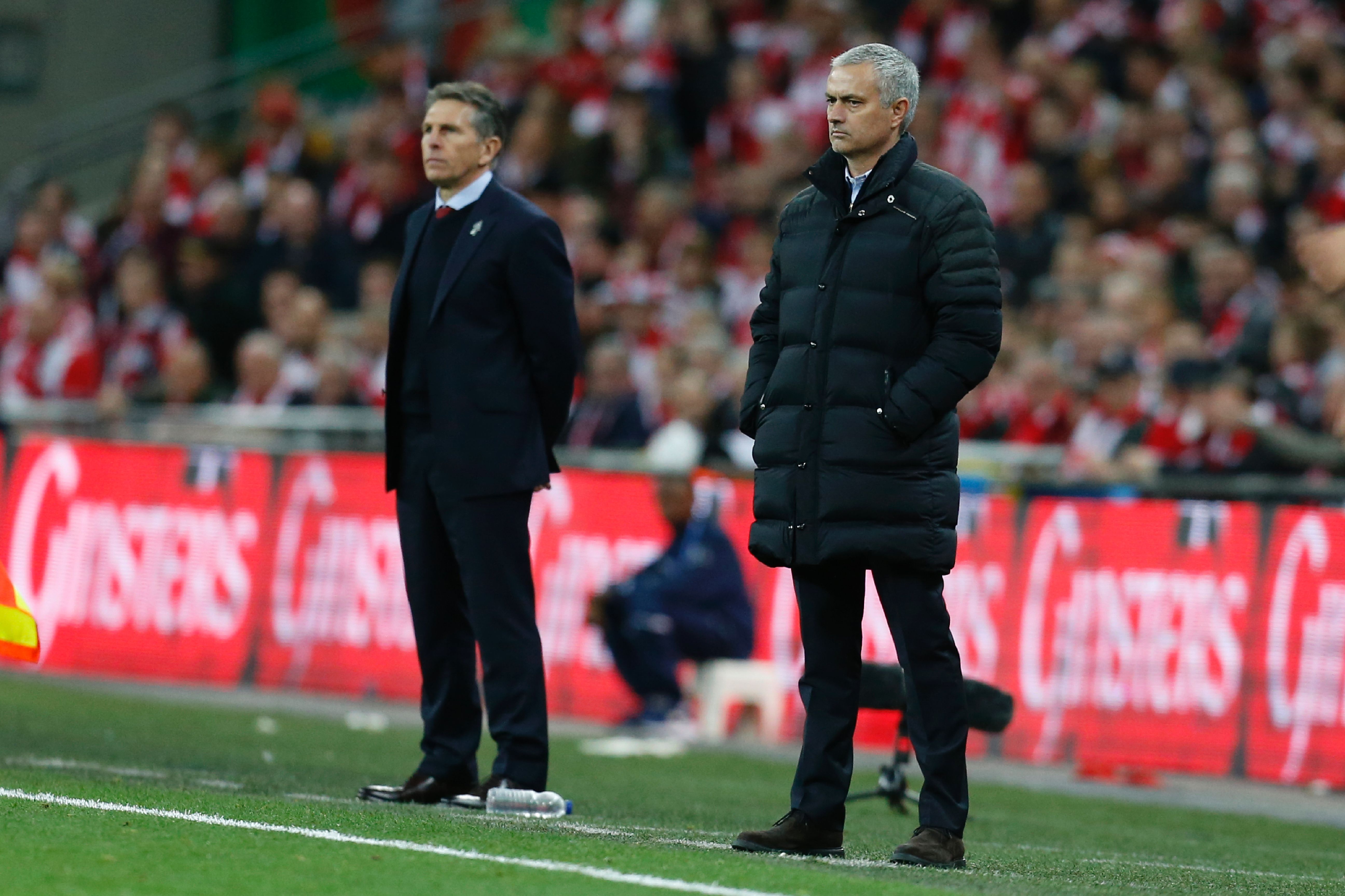 Manchester United's Portuguese manager Jose Mourinho (R) and Southampton's French manager Claude Puel watch from the touchline during the English League Cup final football match between Manchester United and Southampton at Wembley stadium in north London on February 26, 2017.
Manchester United won the game 3-2. / AFP / Ian KINGTON / RESTRICTED TO EDITORIAL USE. No use with unauthorized audio, video, data, fixture lists, club/league logos or 'live' services. Online in-match use limited to 75 images, no video emulation. No use in betting, games or single club/league/player publications.  /         (Photo credit should read IAN KINGTON/AFP/Getty Images)