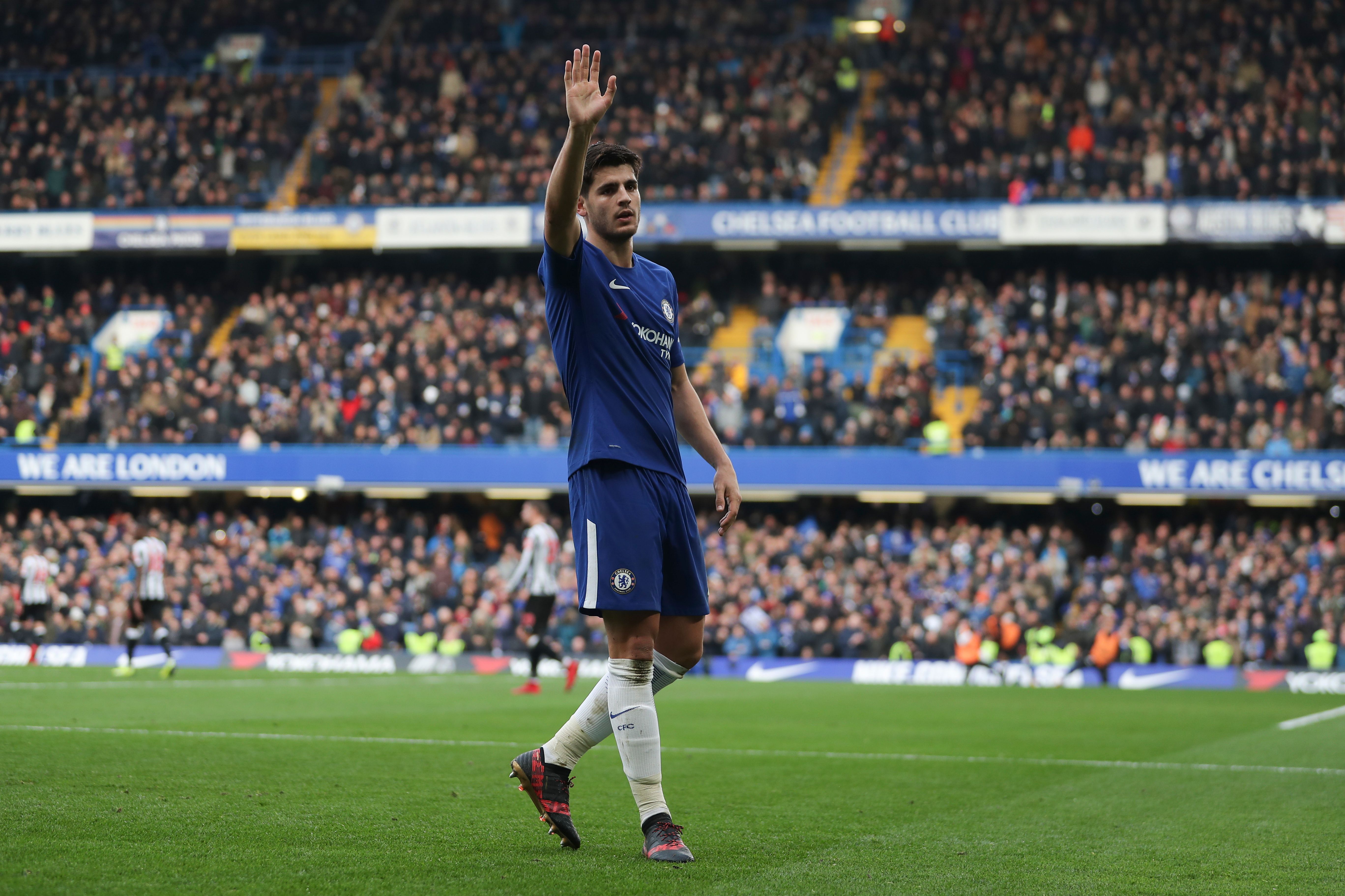 Chelsea's Spanish striker Alvaro Morata celebrates scoring his team's second goal during the English Premier League football match between Chelsea and Newcastle United at Stamford Bridge in London on December 2, 2017. / AFP PHOTO / Daniel LEAL-OLIVAS / RESTRICTED TO EDITORIAL USE. No use with unauthorized audio, video, data, fixture lists, club/league logos or 'live' services. Online in-match use limited to 75 images, no video emulation. No use in betting, games or single club/league/player publications.  /         (Photo credit should read DANIEL LEAL-OLIVAS/AFP/Getty Images)