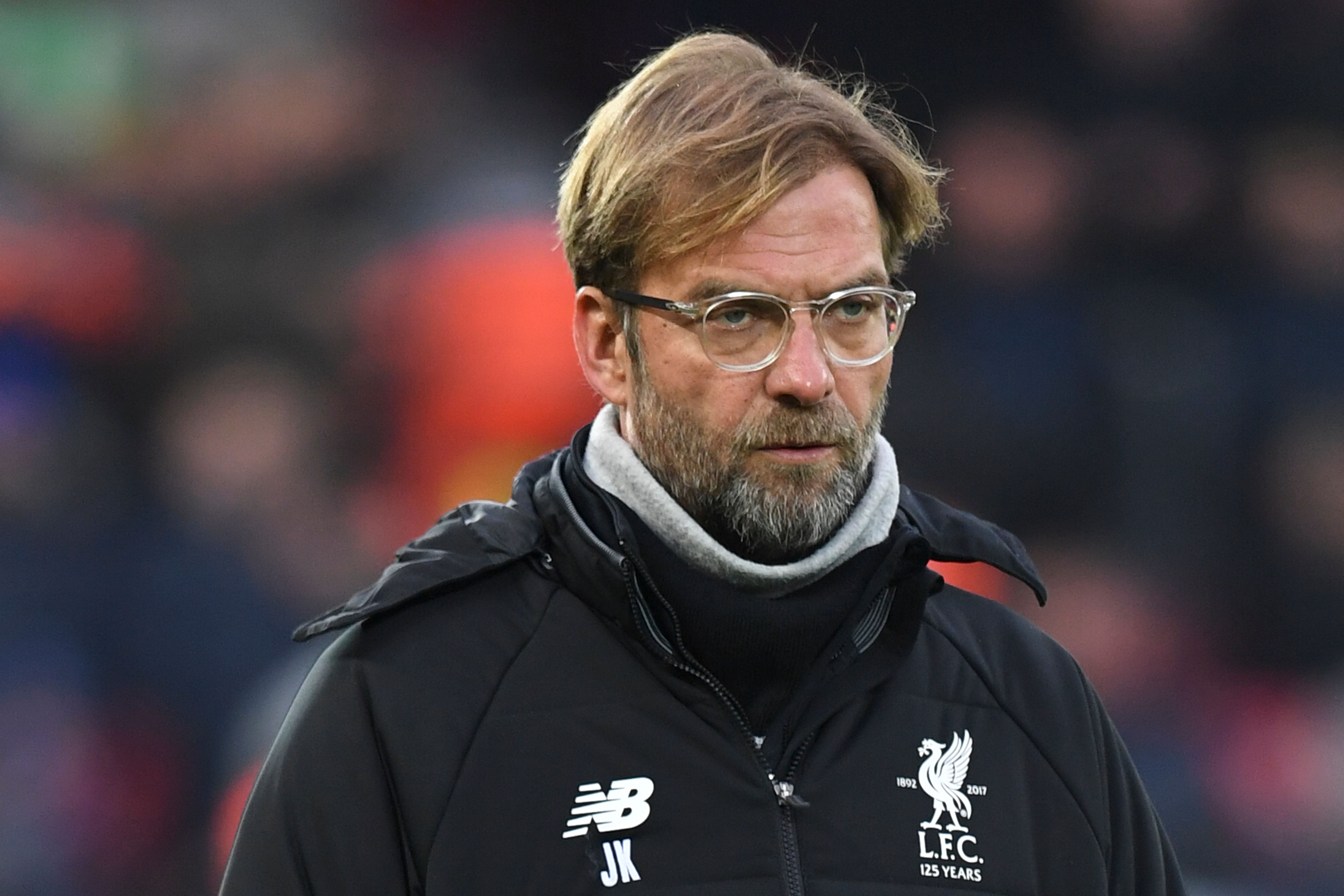 Liverpool's German manager Jurgen Klopp is seen ahead of the English Premier League football match between Liverpool and Everton at Anfield in Liverpool, north west England on December 10, 2017.  / AFP PHOTO / Paul ELLIS / RESTRICTED TO EDITORIAL USE. No use with unauthorized audio, video, data, fixture lists, club/league logos or 'live' services. Online in-match use limited to 75 images, no video emulation. No use in betting, games or single club/league/player publications.  /         (Photo credit should read PAUL ELLIS/AFP/Getty Images)
