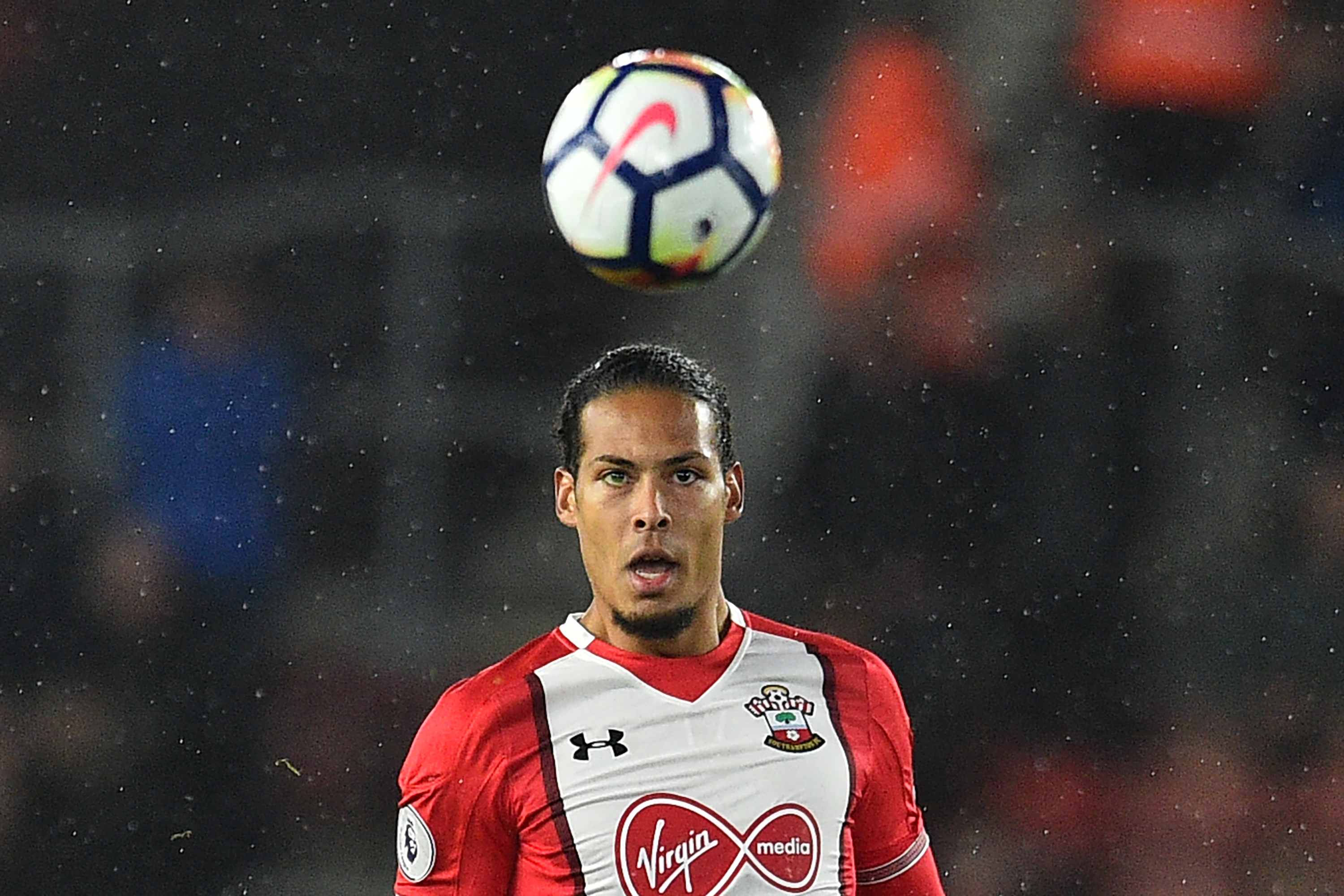 Southampton's Dutch defender Virgil van Dijk watches the ball during the English Premier League football match between Southampton and West Bromwich Albion at St Mary's Stadium in Southampton, southern England on October 21, 2017. / AFP PHOTO / Glyn KIRK / RESTRICTED TO EDITORIAL USE. No use with unauthorized audio, video, data, fixture lists, club/league logos or 'live' services. Online in-match use limited to 75 images, no video emulation. No use in betting, games or single club/league/player publications.  /         (Photo credit should read GLYN KIRK/AFP/Getty Images)