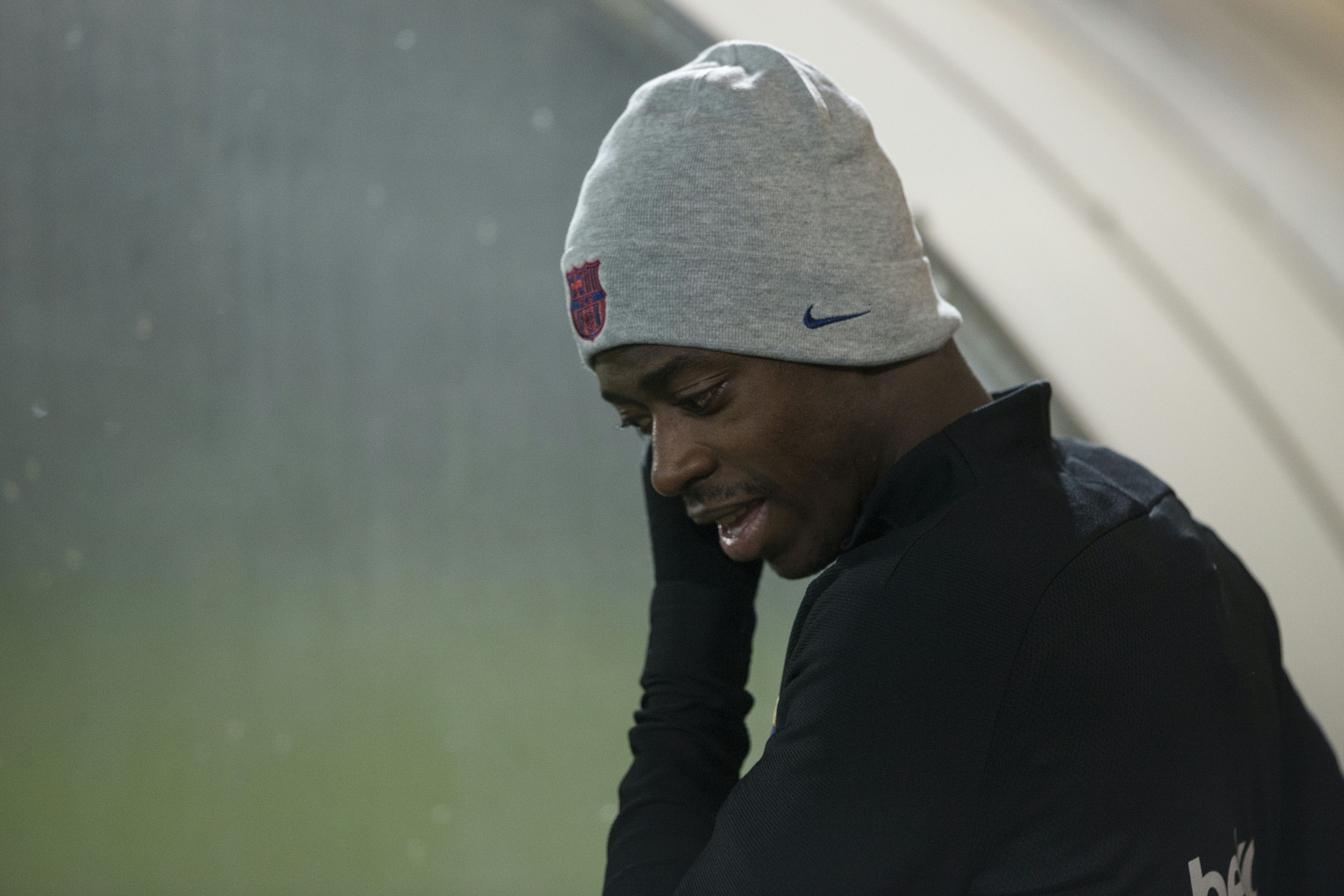 Barcelona's French forward Ousmane Dembele looks on during a training session at the FC Barcelona Joan Gamper sports center in Sant Joan Despi, near Barcelona, on December 9, 2017.  / AFP PHOTO / Josep LAGO        (Photo credit should read JOSEP LAGO/AFP/Getty Images)