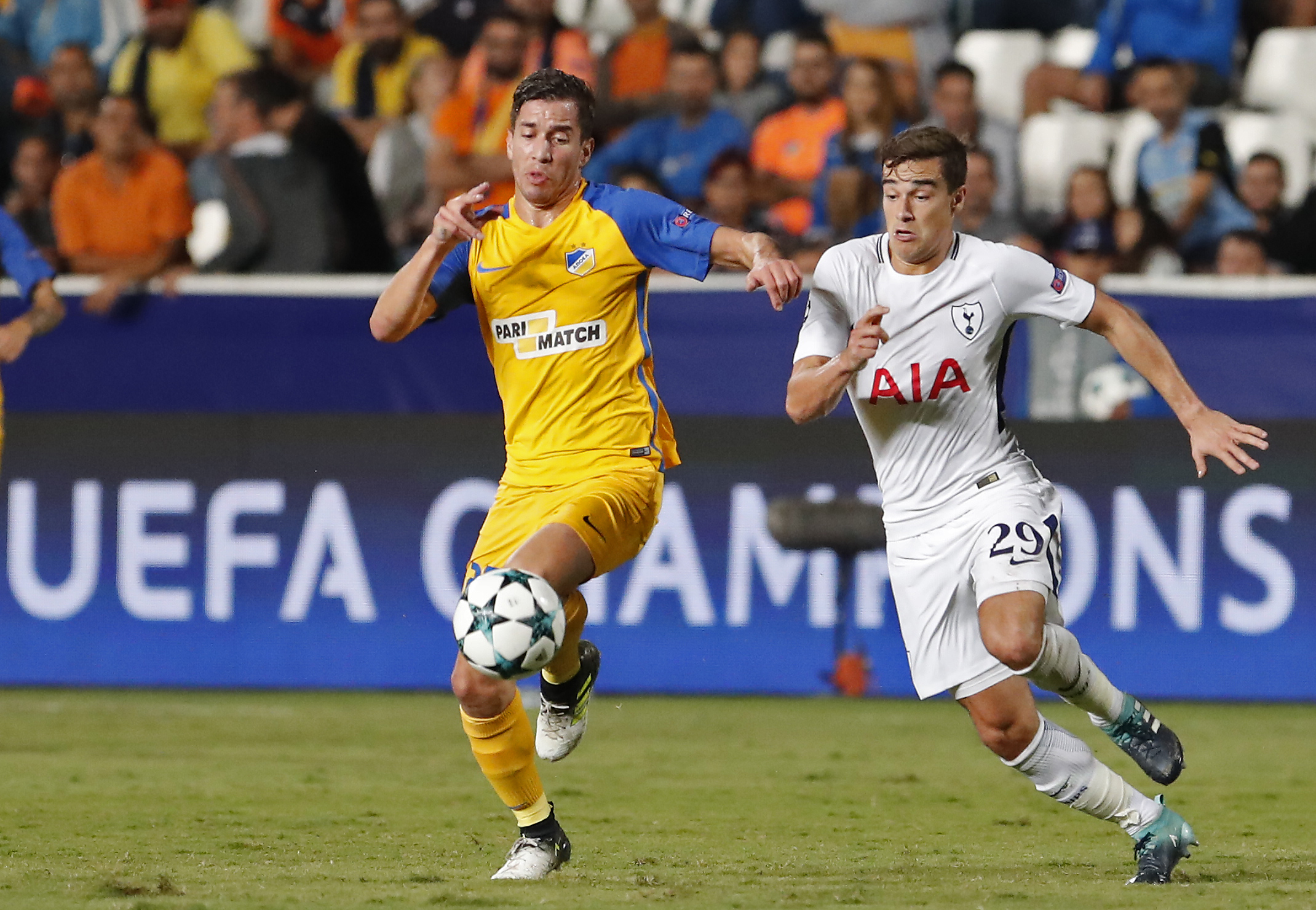 Apoel FC's Argentine midfielder Agustin Farias (L) is marked by Tottenham Hotspur's English midfielder Harry Winks during the UEFA Champions League football match between Apoel FC and Tottenham Hotspur at the GSP Stadium in the Cypriot capital, Nicosia on September 26, 2017.  / AFP PHOTO / Florian CHOBLET        (Photo credit should read FLORIAN CHOBLET/AFP/Getty Images)