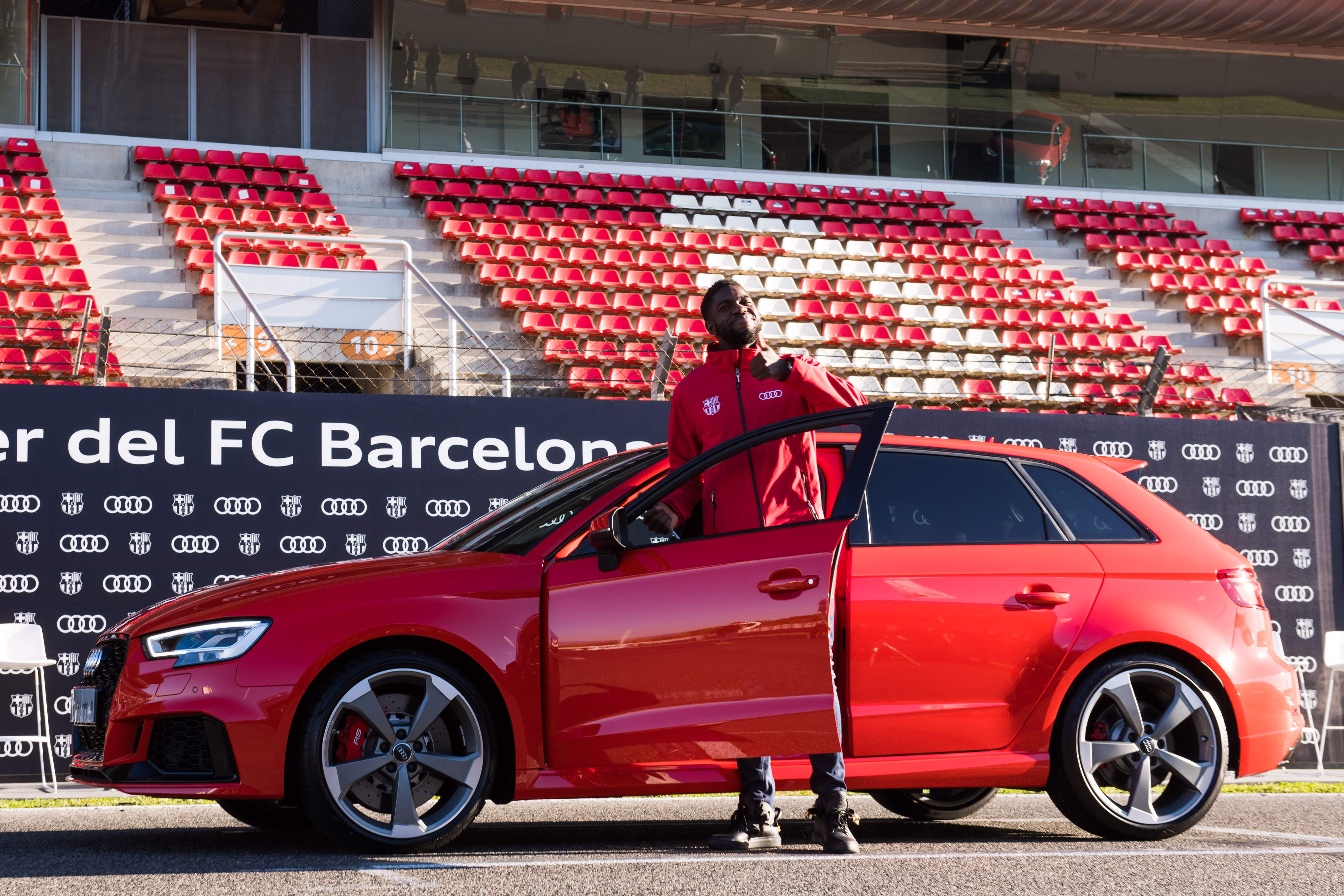 MONTMELO, SPAIN - NOVEMBER 30: Samuel Umtiti of FC Barcelona is presented with his new Audi car during the Audi Car handover to the players of FC Barcelona on November 30, 2017 at Circuit de Barcelona-Catalunya in Montmelo, near Barcelona, Spain. (Photo by Alex Caparros/Getty Images for AUDI)