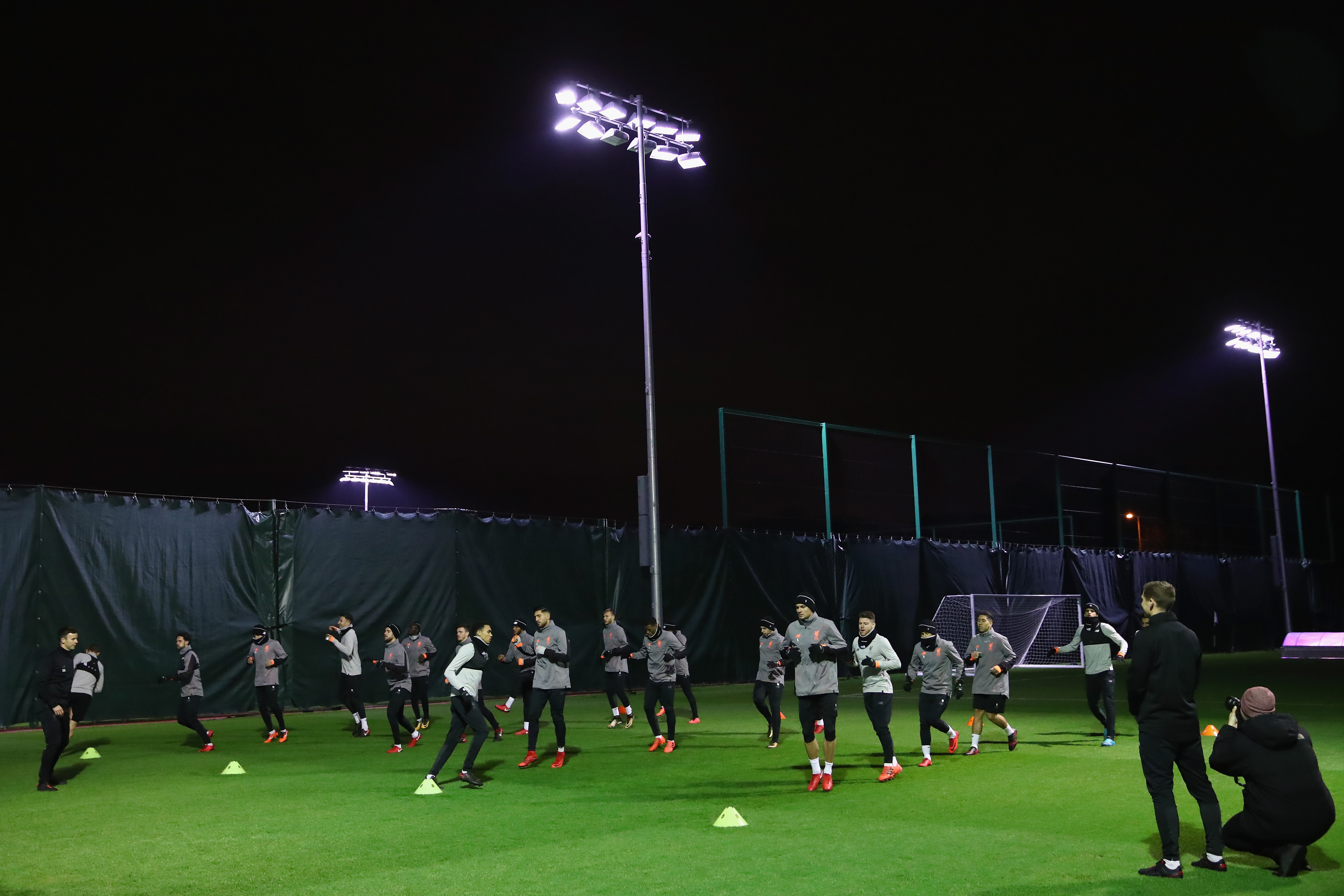 LIVERPOOL, ENGLAND - DECEMBER 05: Players of Liverpool warm up prior to a Liverpool FC training session at Melwood Training Ground on December 5, 2017 in Liverpool, England.  (Photo by Clive Brunskill/Getty Images)