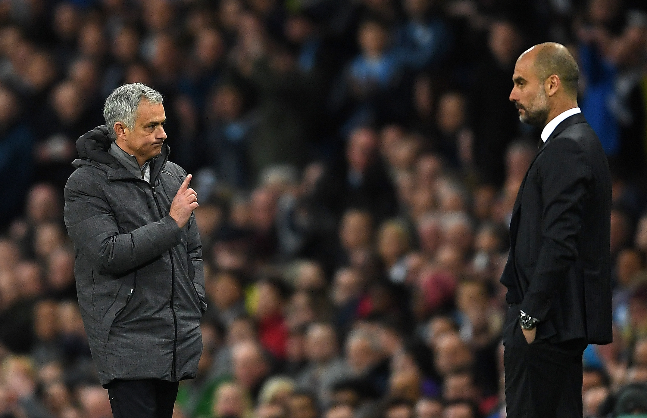 MANCHESTER, ENGLAND - APRIL 27: Jose Mourinho, Manager of Manchester United (L) and Josep Guardiola, Manager of Manchester City (R) during the Premier League match between Manchester City and Manchester United at Etihad Stadium on April 27, 2017 in Manchester, England.  (Photo by Laurence Griffiths/Getty Images)