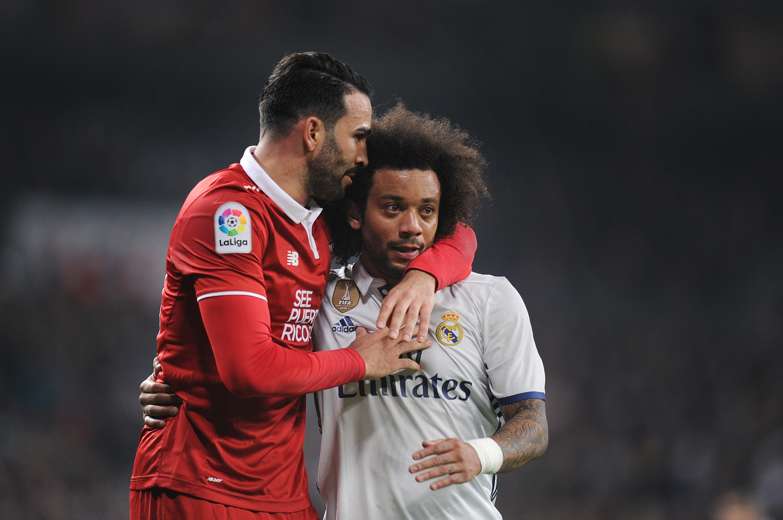 MADRID, SPAIN - JANUARY 04:  Adil Rami of Sevilla FC reacts with Marcelo of Real Madrid after he stopped Marcelo's attack during the Copa del Rey Round of 16 First Leg match between Real Madrid and Sevilla  at Bernabeu on January 4, 2017 in Madrid, Spain.  (Photo by Denis Doyle/Getty Images)