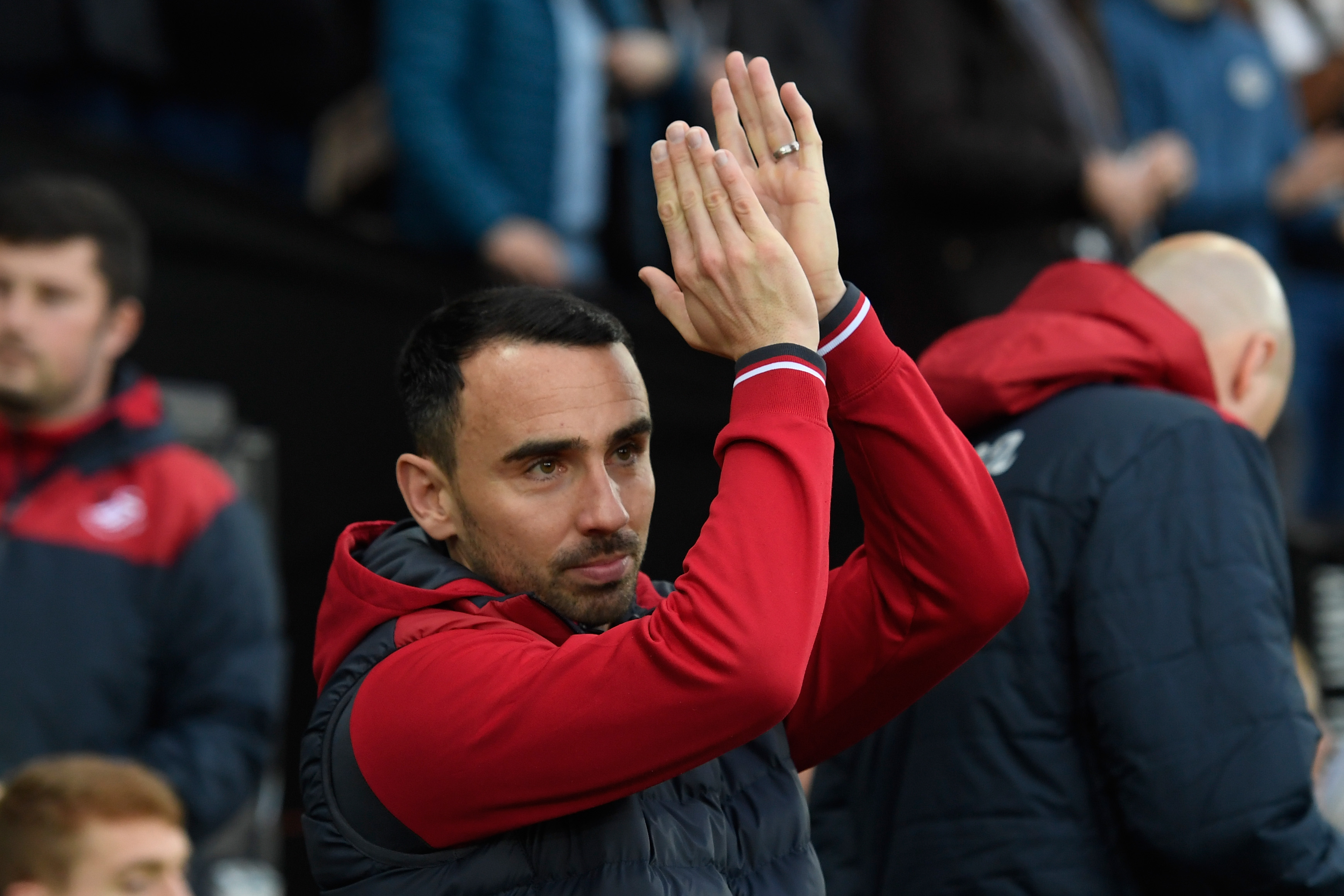 SWANSEA, WALES - DECEMBER 23:  Leon Britton, Caretaker manager Player/Manager of Swansea City applauds fans prior to the Premier League match between Swansea City and Crystal Palace at Liberty Stadium on December 23, 2017 in Swansea, Wales.  (Photo by Stu Forster/Getty Images)