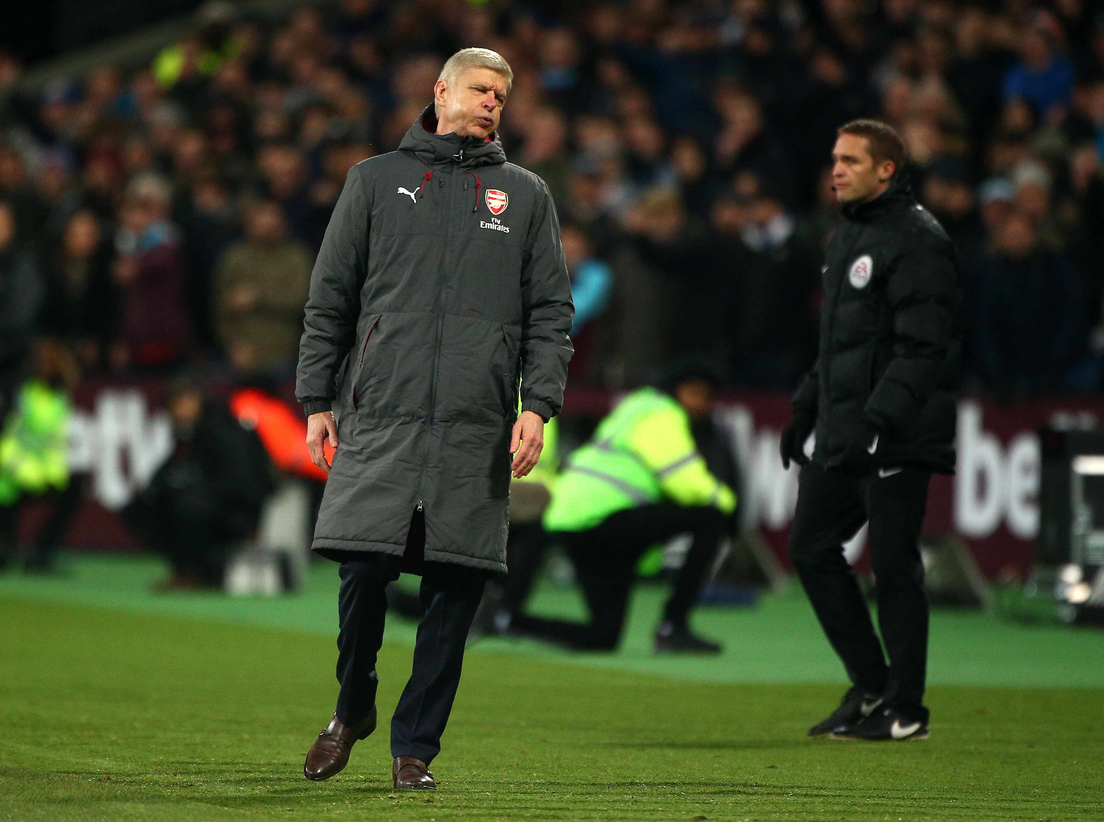 LONDON, ENGLAND - DECEMBER 13:  Arsene Wenger, Manager of Arsenal reacts during the Premier League match between West Ham United and Arsenal at London Stadium on December 13, 2017 in London, England.  (Photo by Charlie Crowhurst/Getty Images)