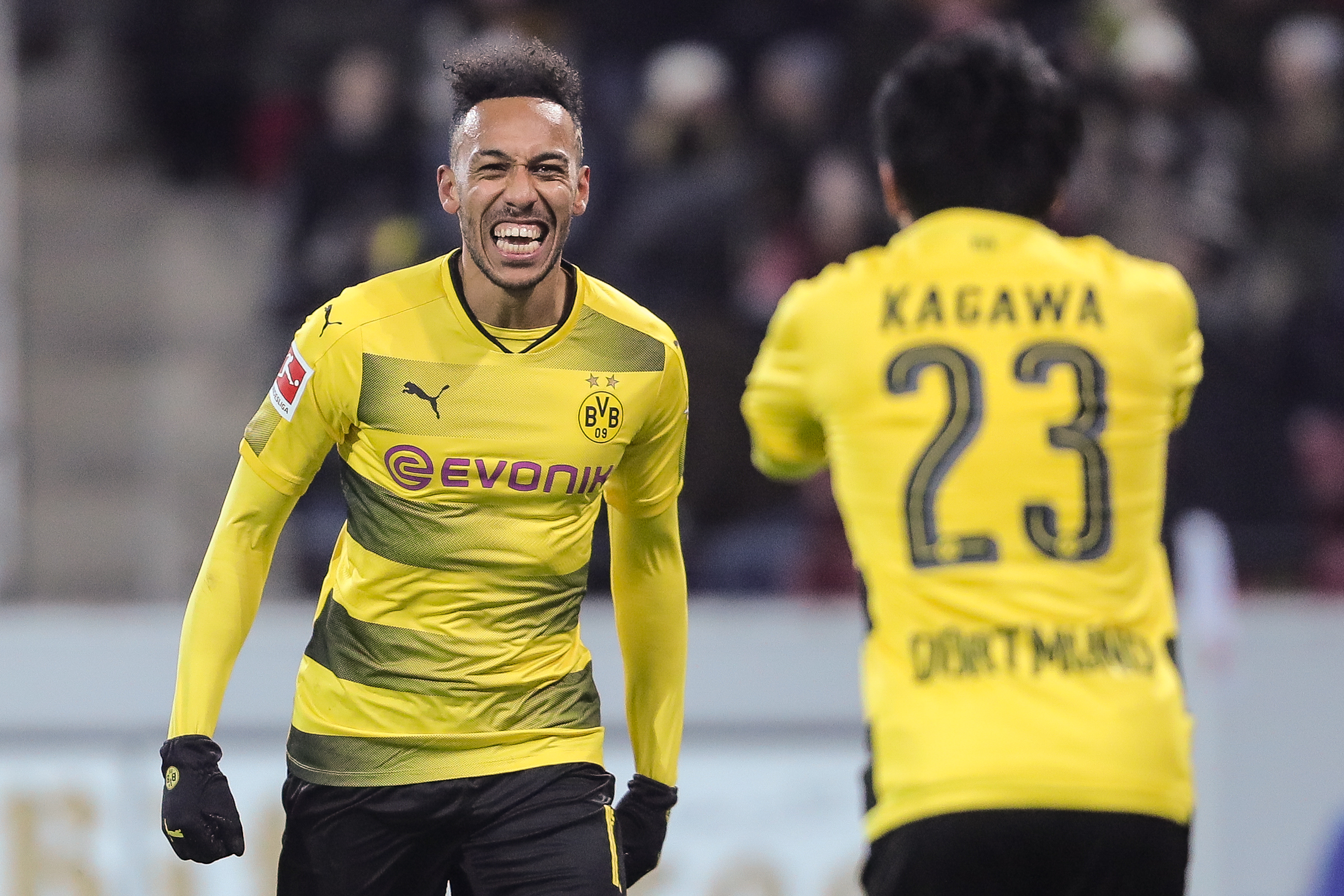 MAINZ, GERMANY - DECEMBER 12: Shinji Kagawa #23 of Borussia Dortmund celebrates with Pierre-Emerick Aubameyang after scoring his team's second goal to make it 0-2 during the Bundesliga match between 1. FSV Mainz 05 and Borussia Dortmund at Opel Arena on December 12, 2017 in Mainz, Germany. (Photo by Simon Hofmann/Bongarts/Getty Images )