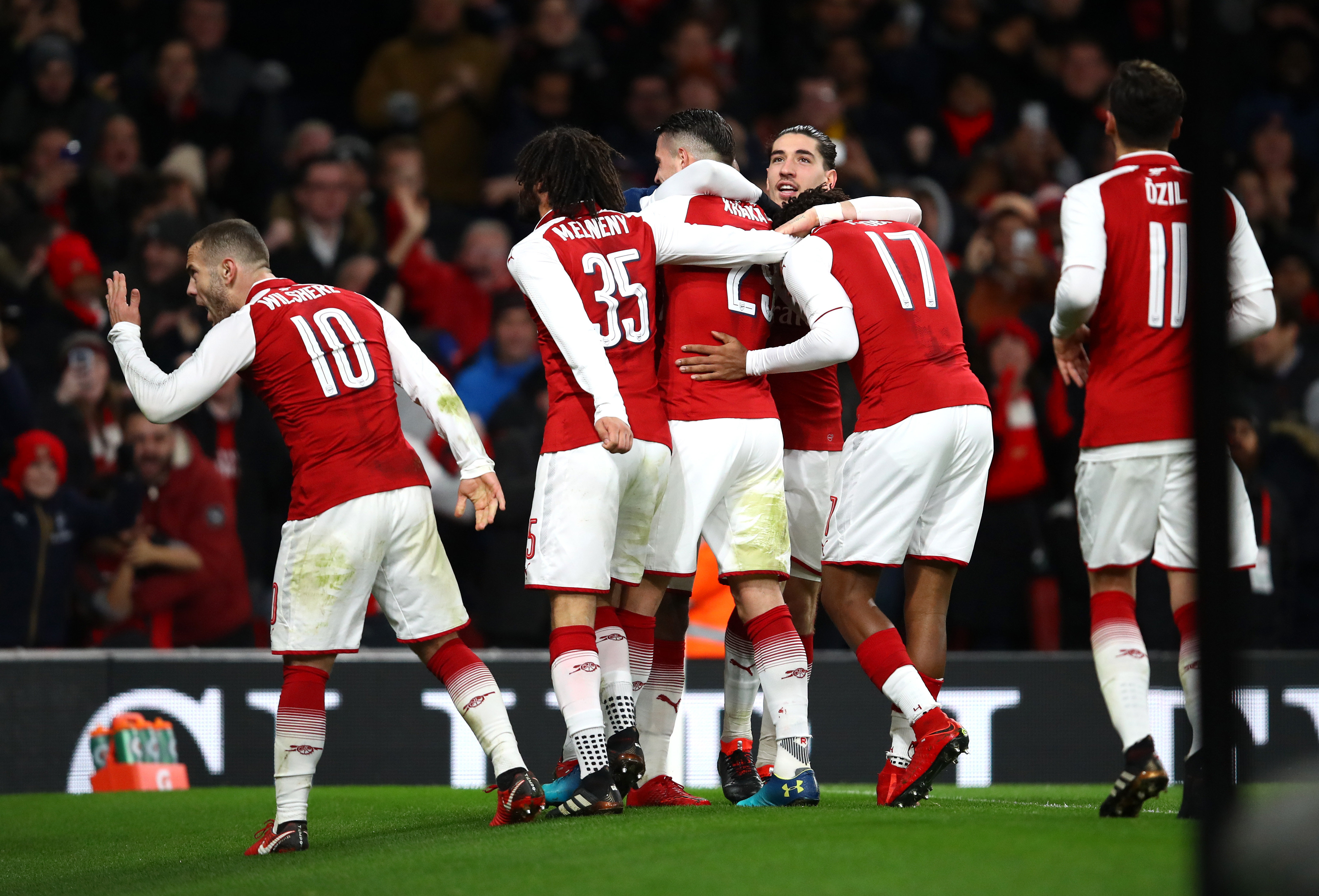 LONDON, ENGLAND - JANUARY 24:  Granit Xhaka of Arsenal celebrates with team mates after scoring his sides second goal during the Carabao Cup Semi-Final Second Leg at Emirates Stadium on January 24, 2018 in London, England.  (Photo by Julian Finney/Getty Images)