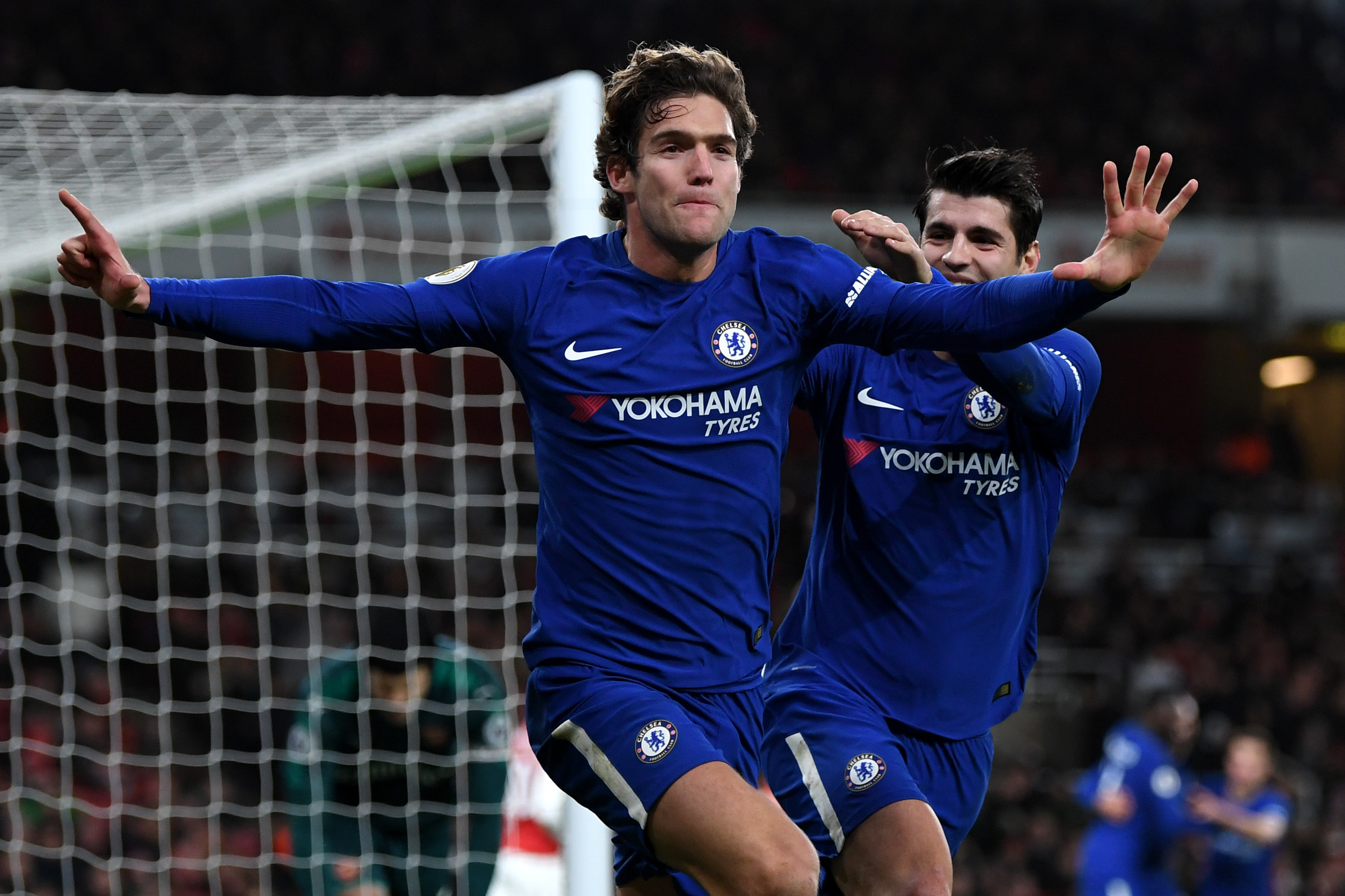 LONDON, ENGLAND - JANUARY 03:   Marcos Alonso of Chelsea celebrates with Alvaro Morata of Chelsea after scoring his sides second goal during the Premier League match between Arsenal and Chelsea at Emirates Stadium on January 3, 2018 in London, England.  (Photo by Shaun Botterill/Getty Images)