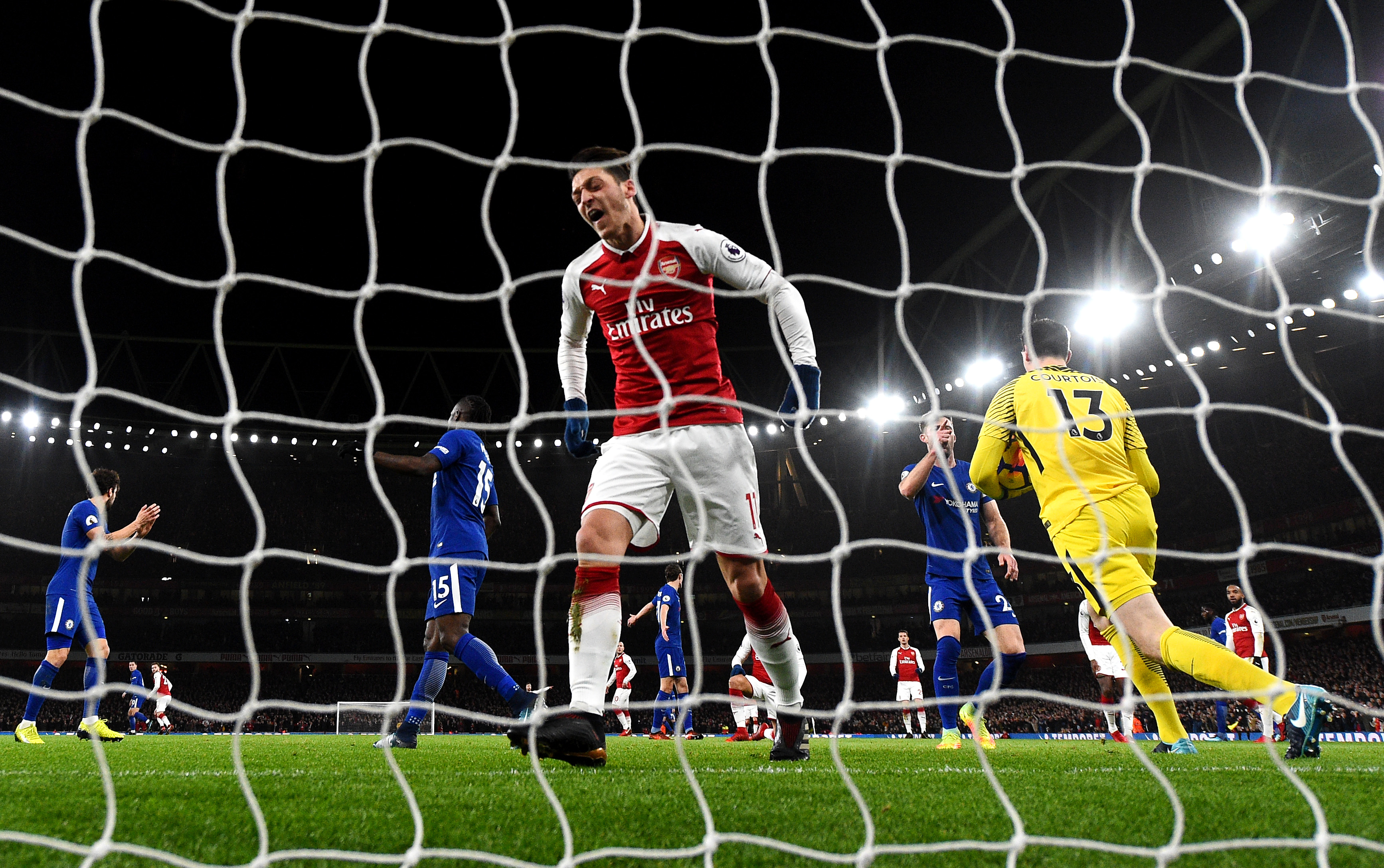 LONDON, ENGLAND - JANUARY 03:  Mesut Ozil of Arsenal reacts after a missed chance during the Premier League match between Arsenal and Chelsea at Emirates Stadium on January 3, 2018 in London, England.  (Photo by Shaun Botterill/Getty Images)