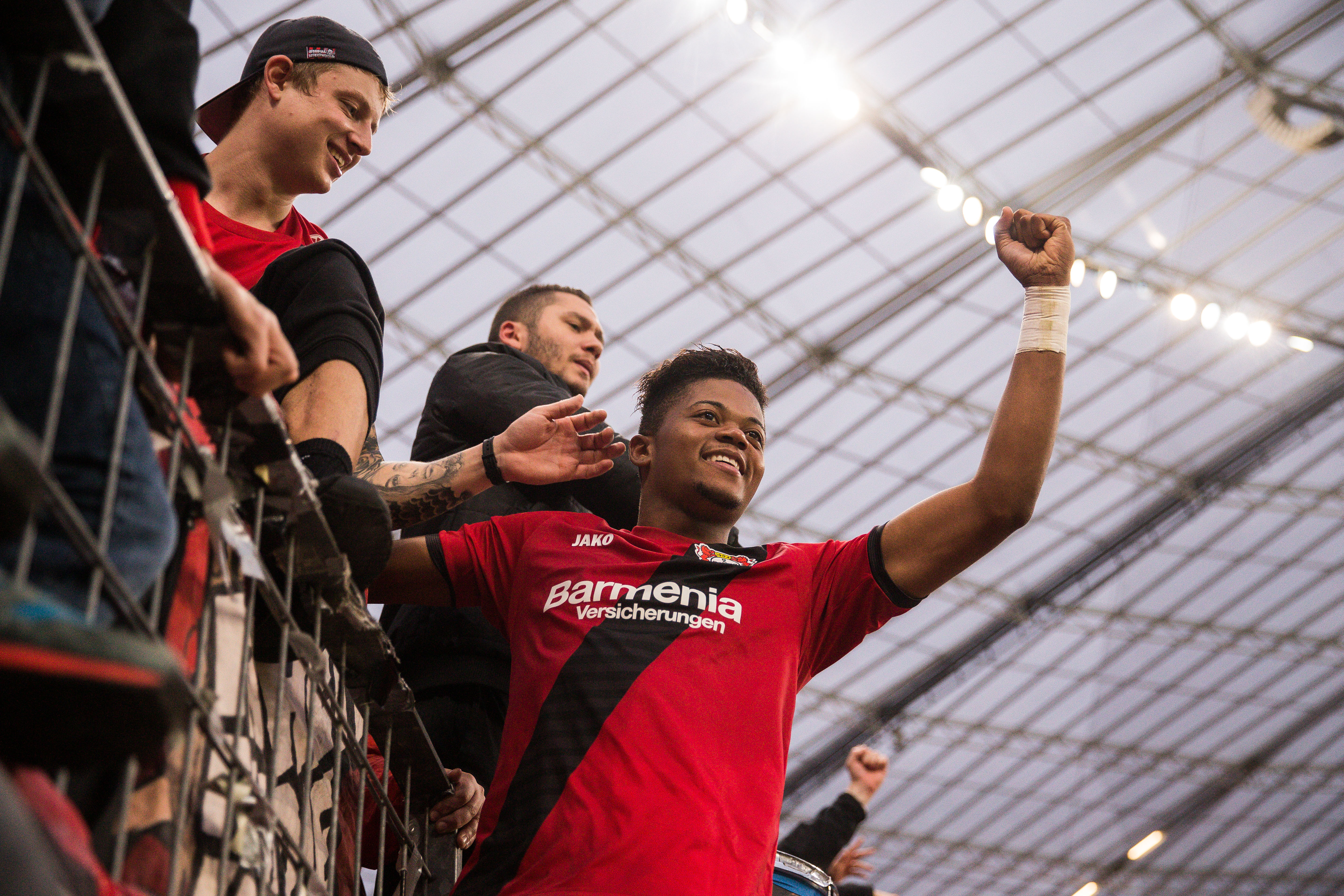 LEVERKUSEN, GERMANY - OCTOBER 28: Leon Bailey of Bayer Leverkusen celebrates with the supporters after the Bundesliga match between Bayer 04 Leverkusen and 1. FC Koeln at BayArena on October 28, 2017 in Leverkusen, Germany. (Photo by Maja Hitij/Bongarts/Getty Images)