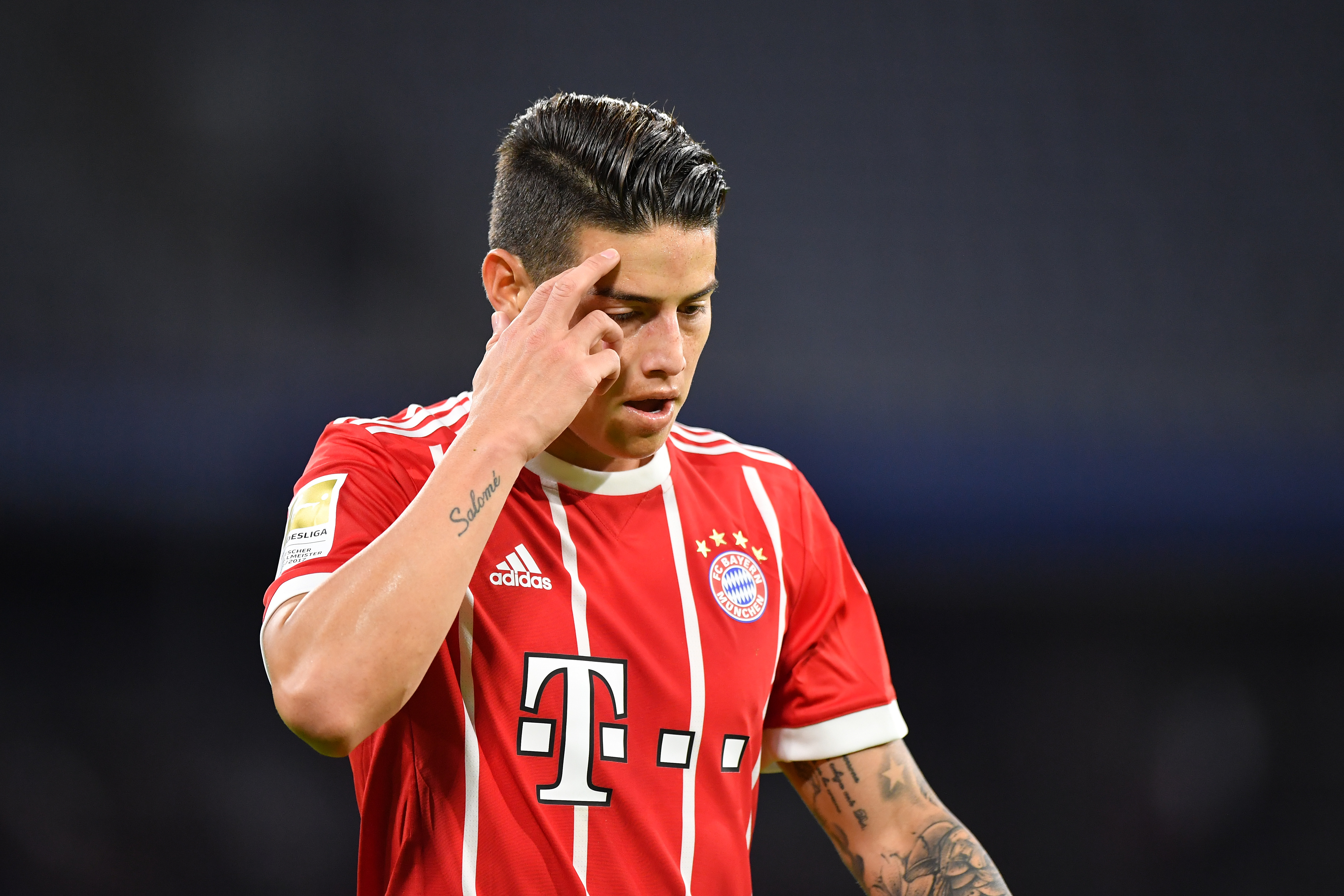 MUNICH, GERMANY - JANUARY 09: James Rodriguez of Bayern Muenchen looks down during the friendly match between Bayern Muenchen and SG Sonnenhof Grossaspach at Allianz Arena on January 9, 2018 in Munich, Germany. (Photo by Sebastian Widmann/Bongarts/Getty Images)