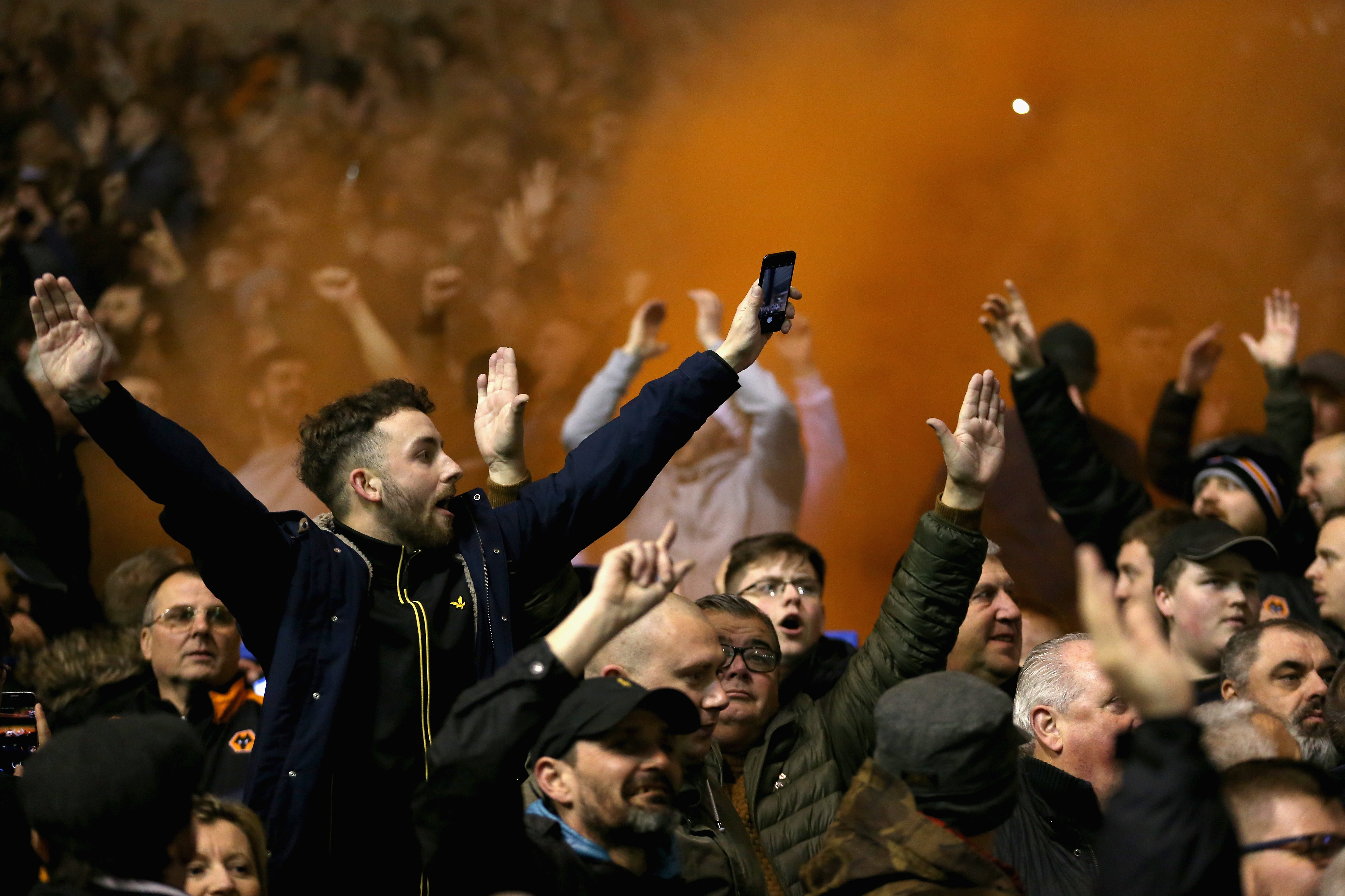 BIRMINGHAM, ENGLAND - DECEMBER 04: Wolves fans celebrate after their side score the opening goal during the Sky Bet Championship match between Birmingham City and Wolverhampton Wanderers at St Andrews Stadium on December 4, 2017 in Birmingham, England.  (Photo by Alex Pantling/Getty Images)