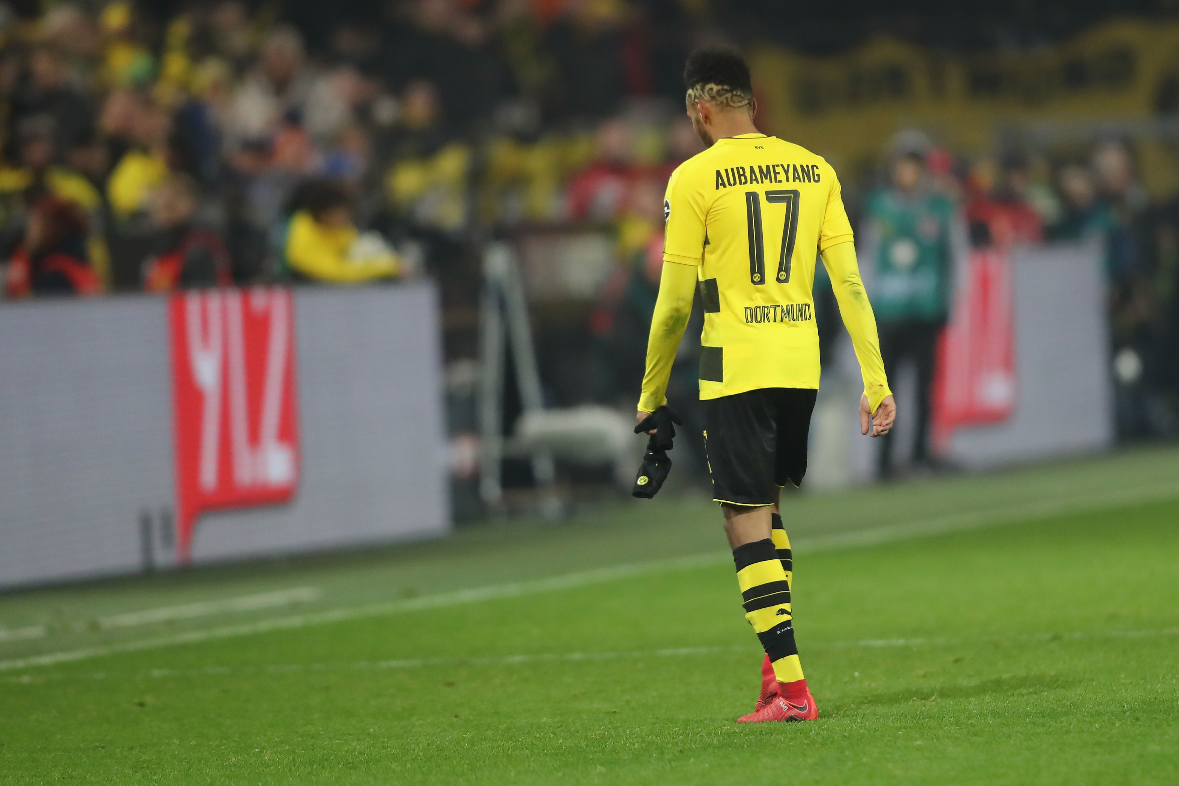 DORTMUND, GERMANY - NOVEMBER 25: Pierre-Emerick Aubameyang of Dortmund walks off the piucth after hgis red card during the Bundesliga match between Borussia Dortmund and FC Schalke 04 at Signal Iduna Park on November 25, 2017 in Dortmund, Germany.  (Photo by Christof Koepsel/Bongarts/Getty Images)