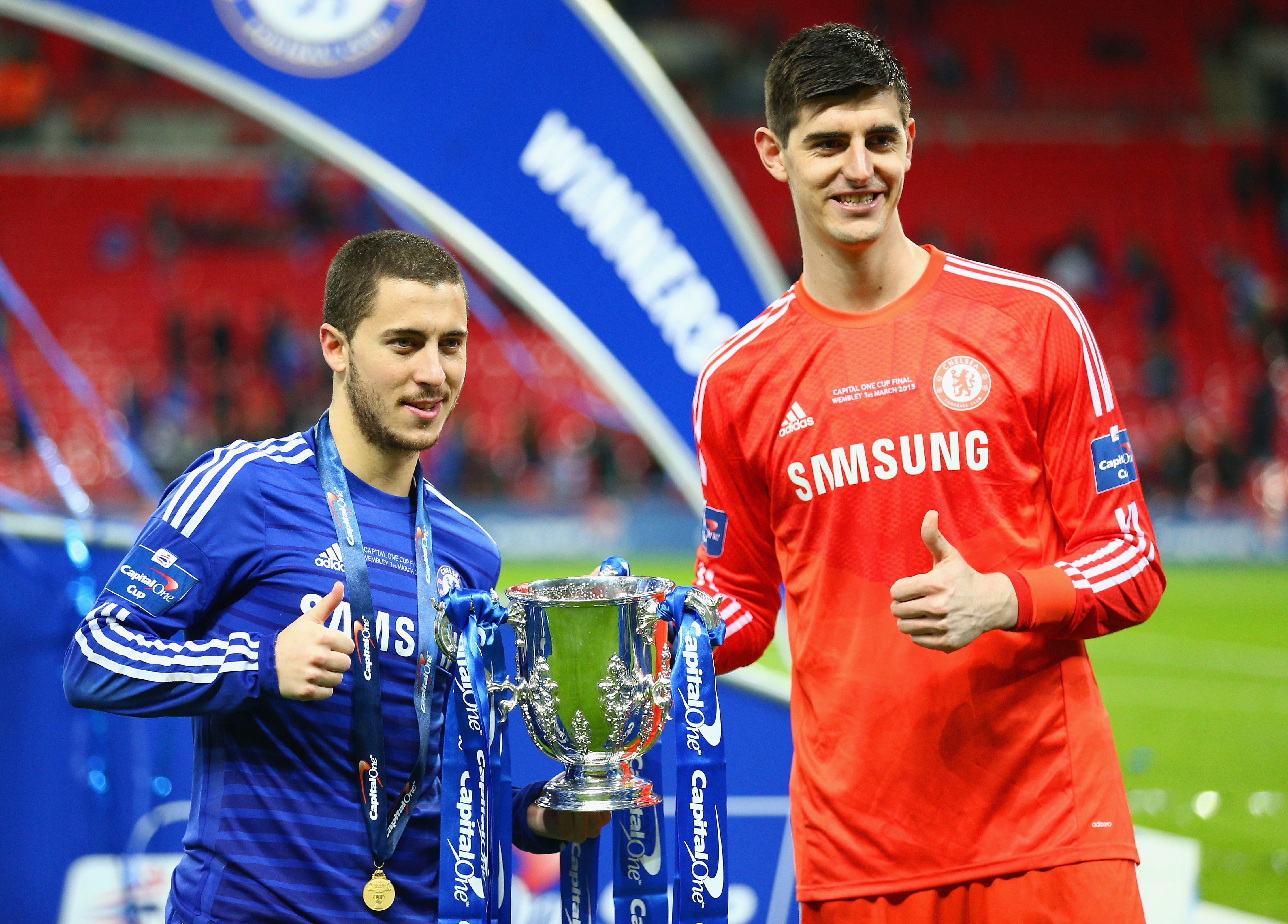 LONDON, ENGLAND - MARCH 01:  Eden Hazard and Thibaut Courtois of Chelsea pose with the trophy during the Capital One Cup Final match between Chelsea and Tottenham Hotspur at Wembley Stadium on March 1, 2015 in London, England.  (Photo by Clive Mason/Getty Images)