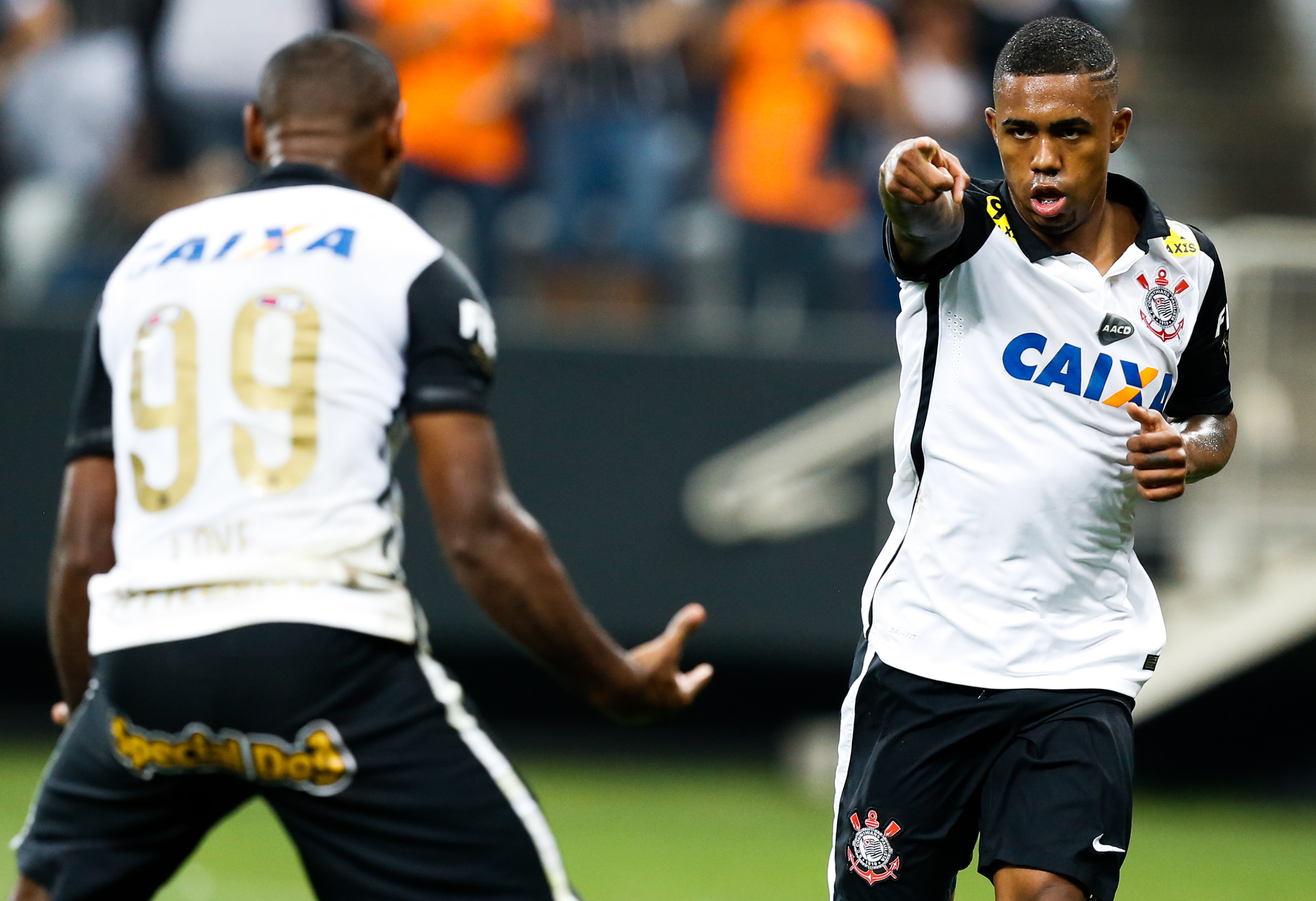 SAO PAULO, BRAZIL - OCTOBER 15: Malcom #21 of Corinthians celebrates their second goal during the match between Corinthians and Goias for the Brazilian Series A 2015 at Arena Corinthians stadium on October 15, 2015 in Sao Paulo, Brazil. (Photo by Alexandre Schneider/Getty Images)