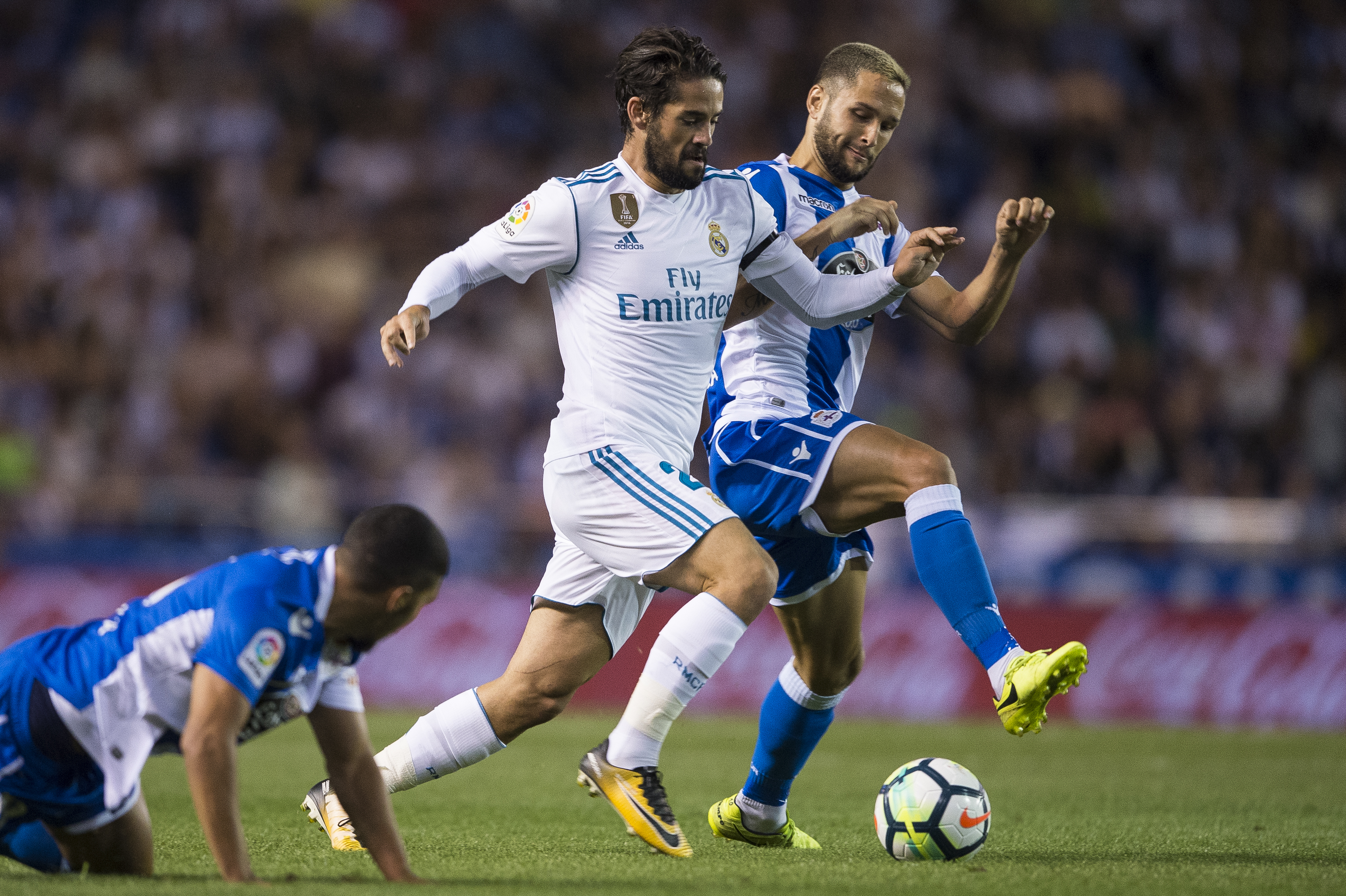 LA CORUNA, SPAIN - AUGUST 20: Florin Andone of RC Deportivo La Coruna competes for the ball with Isco of Real Madrid during the La Liga match between Deportivo La Coruna and Real Madrid at Riazor Stadium on August 20, 2017 in La Coruna, Spain. (Photo by Octavio Passos/Getty Images)