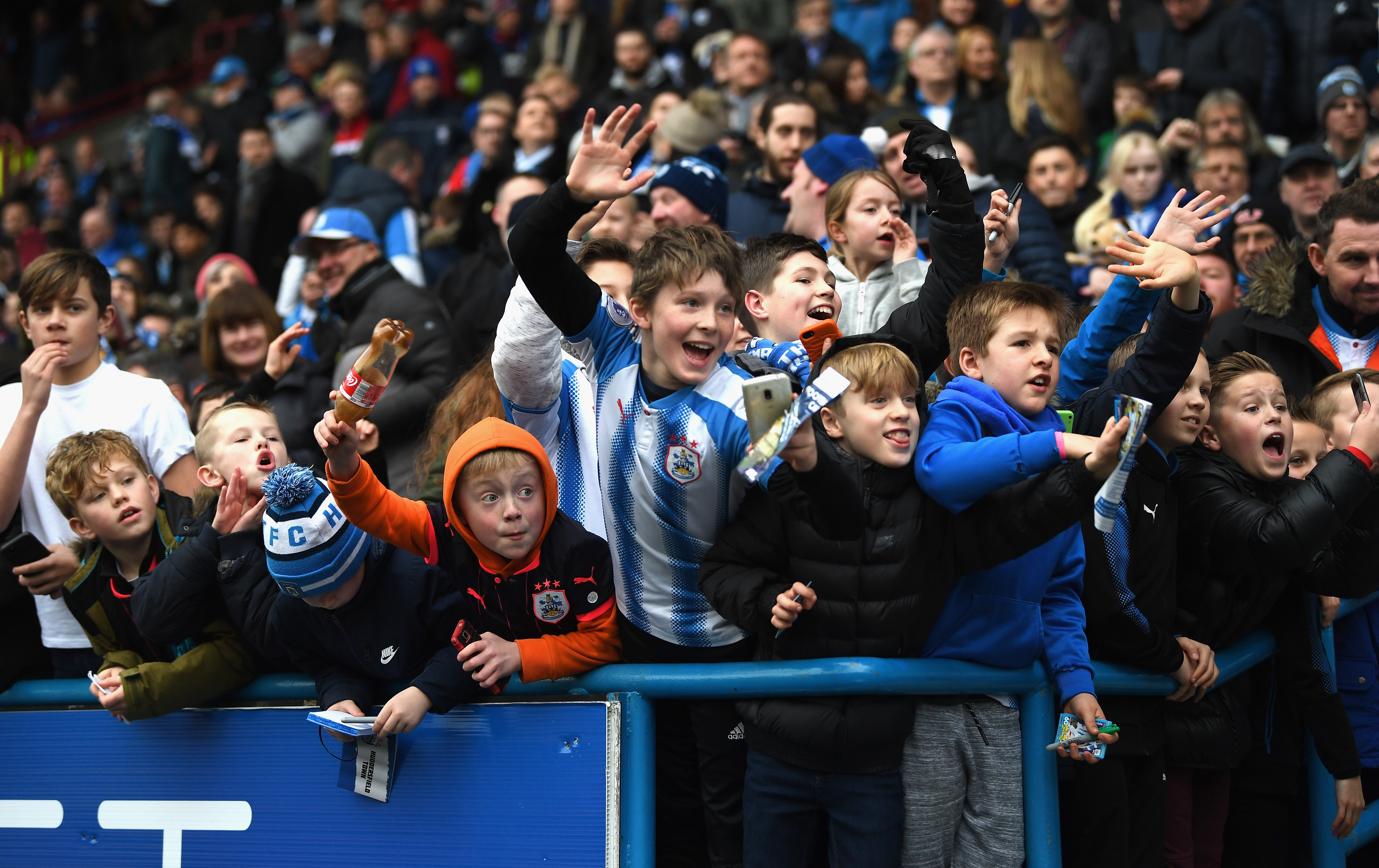 HUDDERSFIELD, ENGLAND - JANUARY 27:  Young fans enjoy the pre match atmosphere prior to The Emirates FA Cup Fourth Round match between Huddersfield Town and Birmingham City at John Smith's Stadium on January 27, 2018 in Huddersfield, England.  (Photo by Gareth Copley/Getty Images)