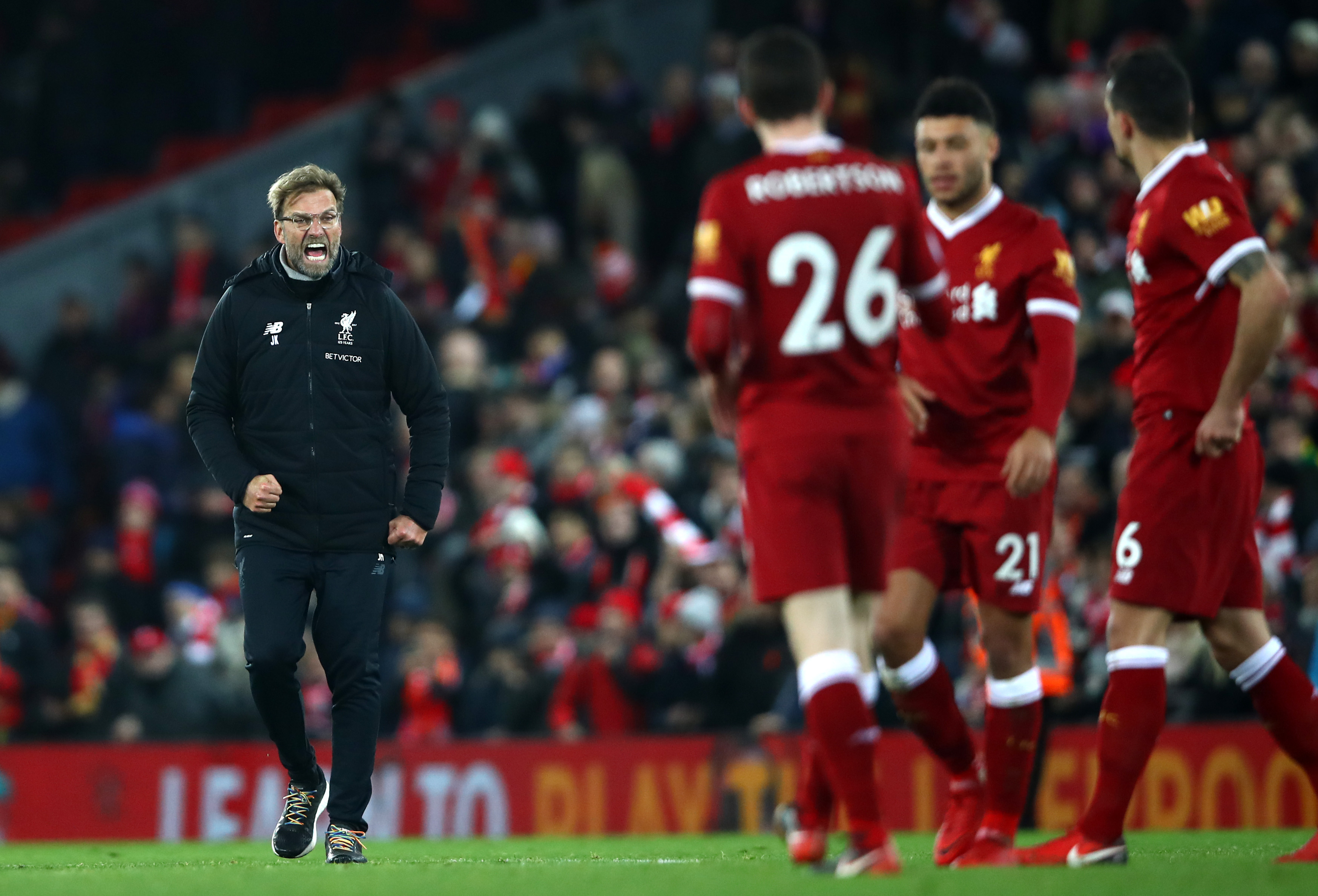 LIVERPOOL, ENGLAND - DECEMBER 30:  Jurgen Klopp, Manager of Liverpool celebrates after the Premier League match between Liverpool and Leicester City at Anfield on December 30, 2017 in Liverpool, England.  (Photo by Clive Brunskill/Getty Images)