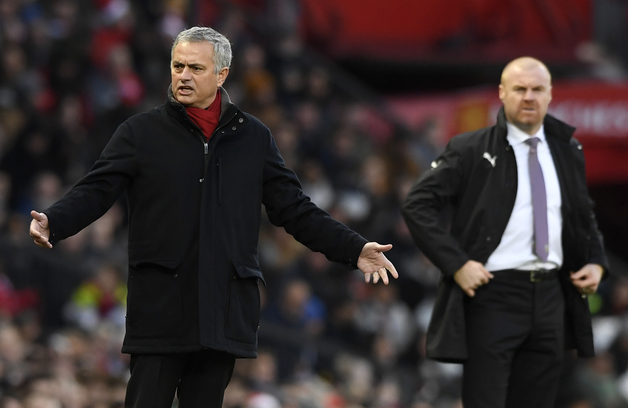 MANCHESTER, ENGLAND - DECEMBER 26:  Jose Mourinho, Manager of Manchester United looks reacts as Sean Dyche, Manager of Burnley looks on during the Premier League match between Manchester United and Burnley at Old Trafford on December 26, 2017 in Manchester, England.  (Photo by Stu Forster/Getty Images)