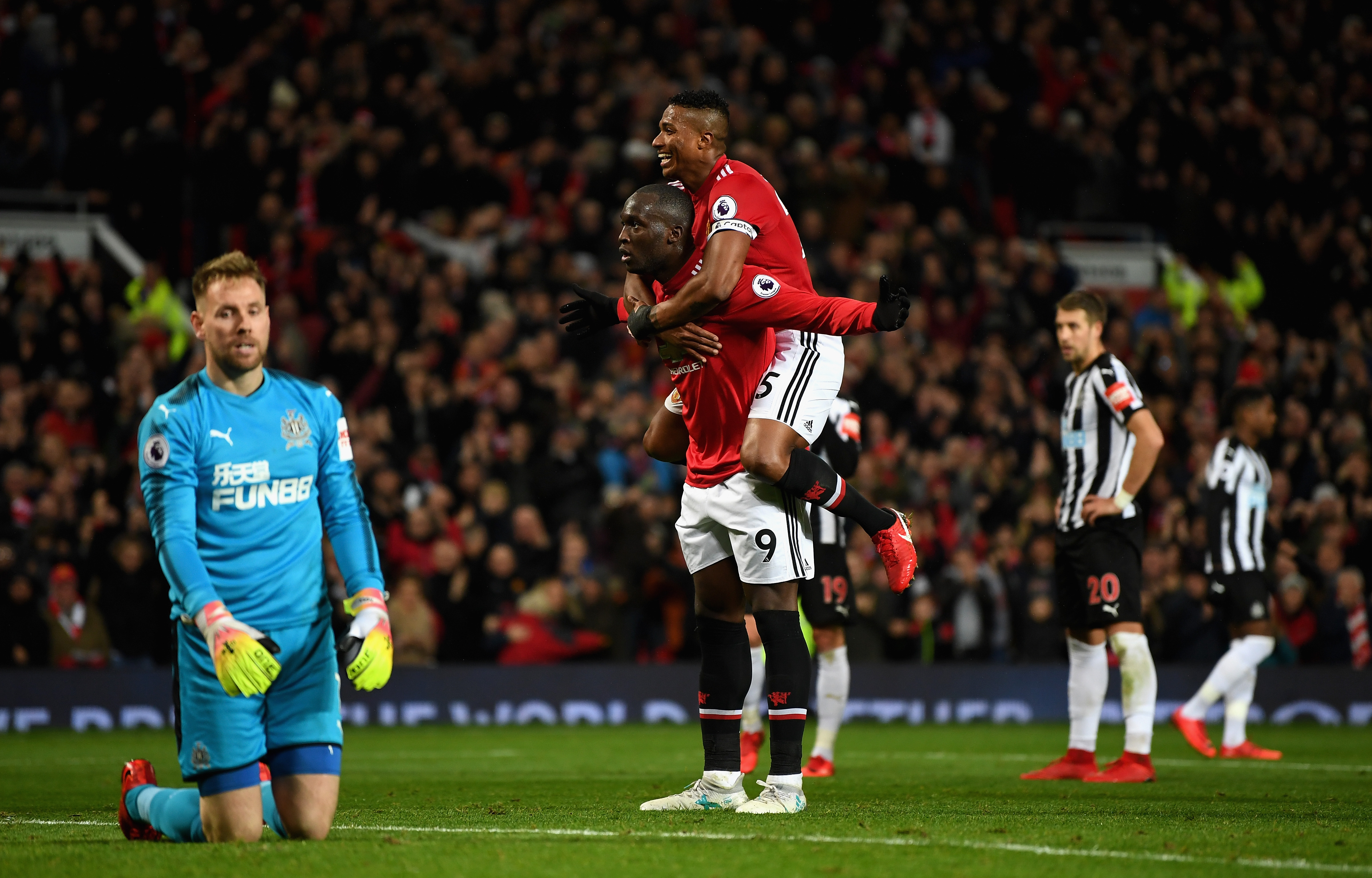 MANCHESTER, ENGLAND - NOVEMBER 18:  Romelu Lukaku of Manchester United celebrates with Antonio Valencia of Manchester United after scoring his sides fourth goal during the Premier League match between Manchester United and Newcastle United at Old Trafford on November 18, 2017 in Manchester, England.  (Photo by Gareth Copley/Getty Images)