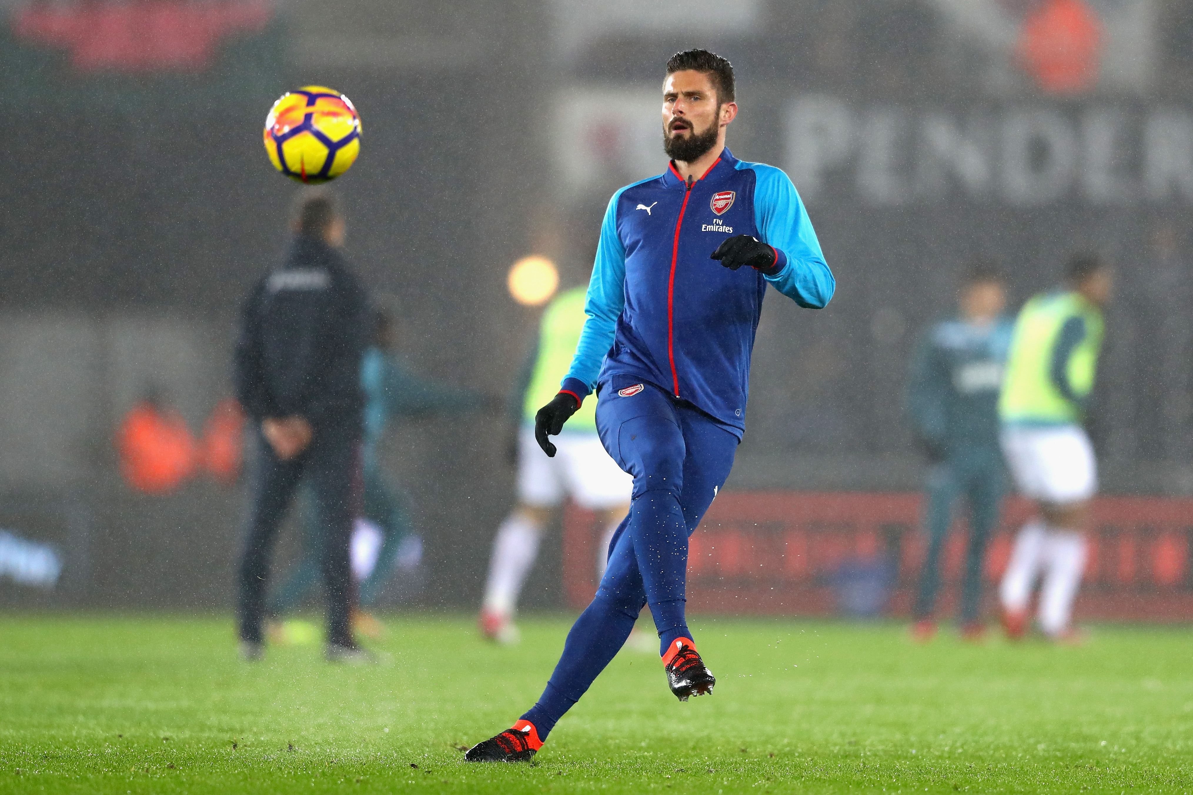 SWANSEA, WALES - JANUARY 30:  Olivier Giroud of Arsenal warms up prior to the Premier League match between Swansea City and Arsenal at Liberty Stadium on January 30, 2018 in Swansea, Wales.  (Photo by Michael Steele/Getty Images)