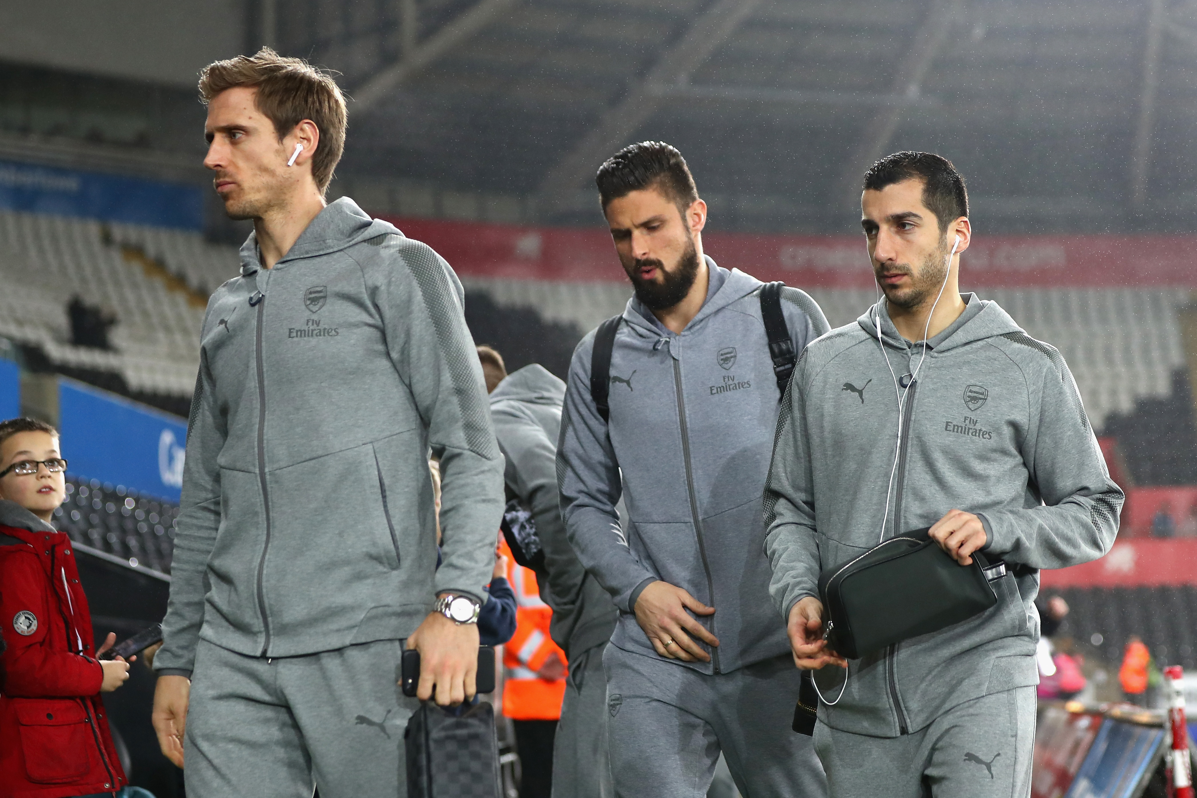 SWANSEA, WALES - JANUARY 30: Nacho Monreal, Olivier Giroud and Henrikh Mkhitaryan of Arsenal arrives at the stadium prior to the Premier League match between Swansea City and Arsenal at Liberty Stadium on January 30, 2018 in Swansea, Wales.  (Photo by Michael Steele/Getty Images)