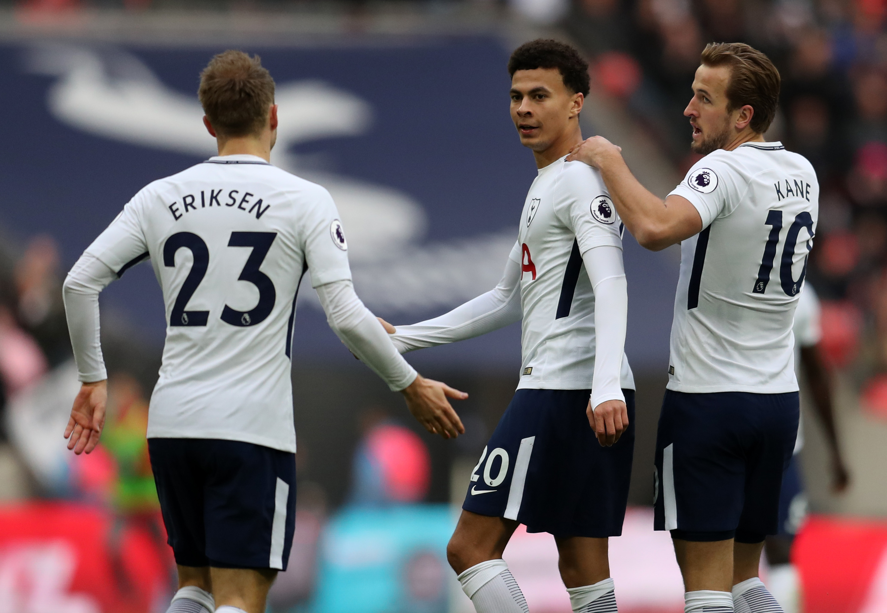 LONDON, ENGLAND - DECEMBER 26: Dele Alli of Tottenham Hotspur celebrates with Harry Kane and Christian Eriksen of Tottenham Hotspur during the Premier League match between Tottenham Hotspur and Southampton at Wembley Stadium on December 26, 2017 in London, England. (Photo by Catherine Ivill/Getty Images)