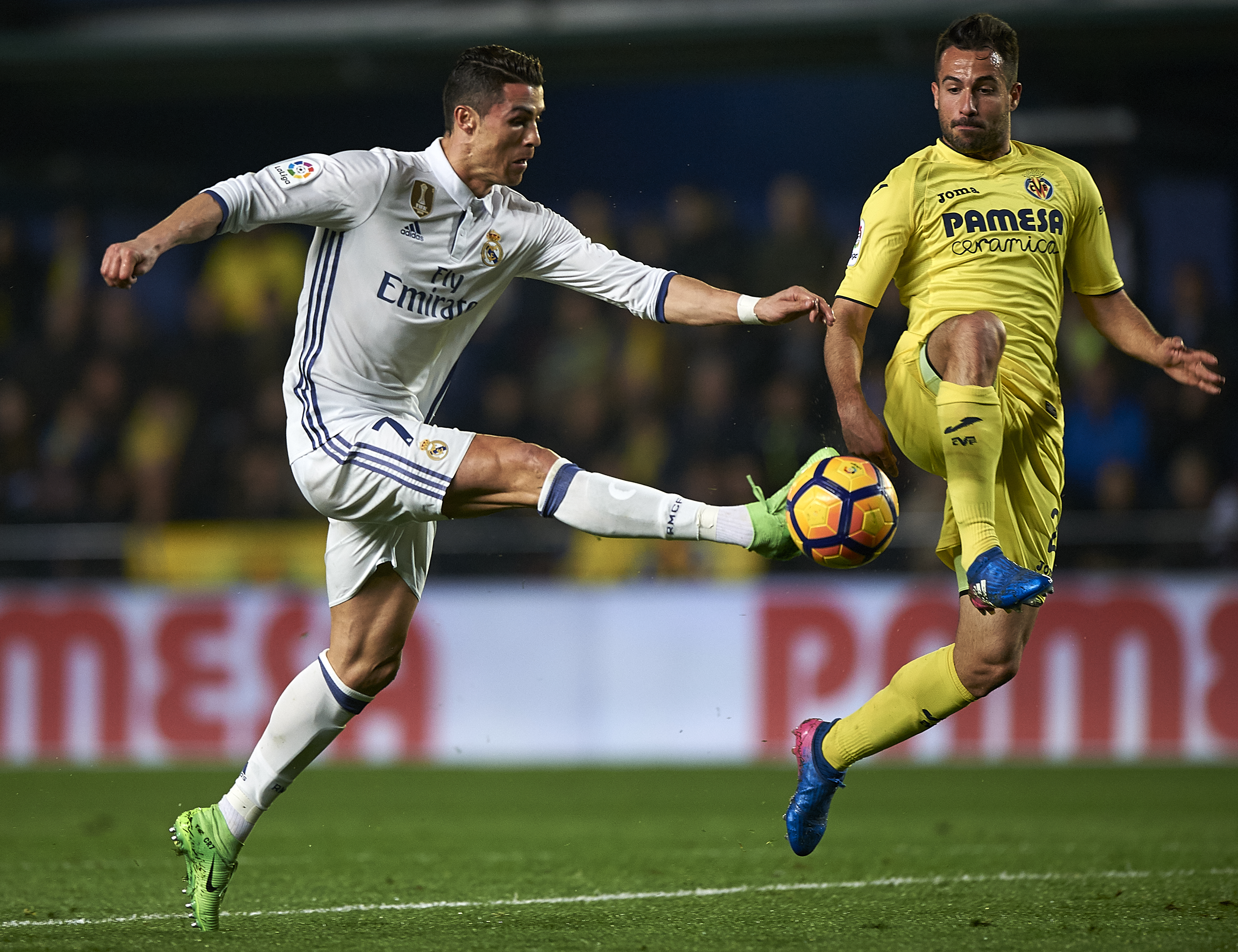 VILLARREAL, SPAIN - FEBRUARY 26:  Mario Gaspar (R) of Villarreal competes for the ball with Cristiano Ronaldo of Real Madrid during the La Liga match between Villarreal CF and Real Madrid at Estadio de la Ceramica on February 26, 2017 in Villarreal, Spain.  (Photo by Fotopress/Getty Images)