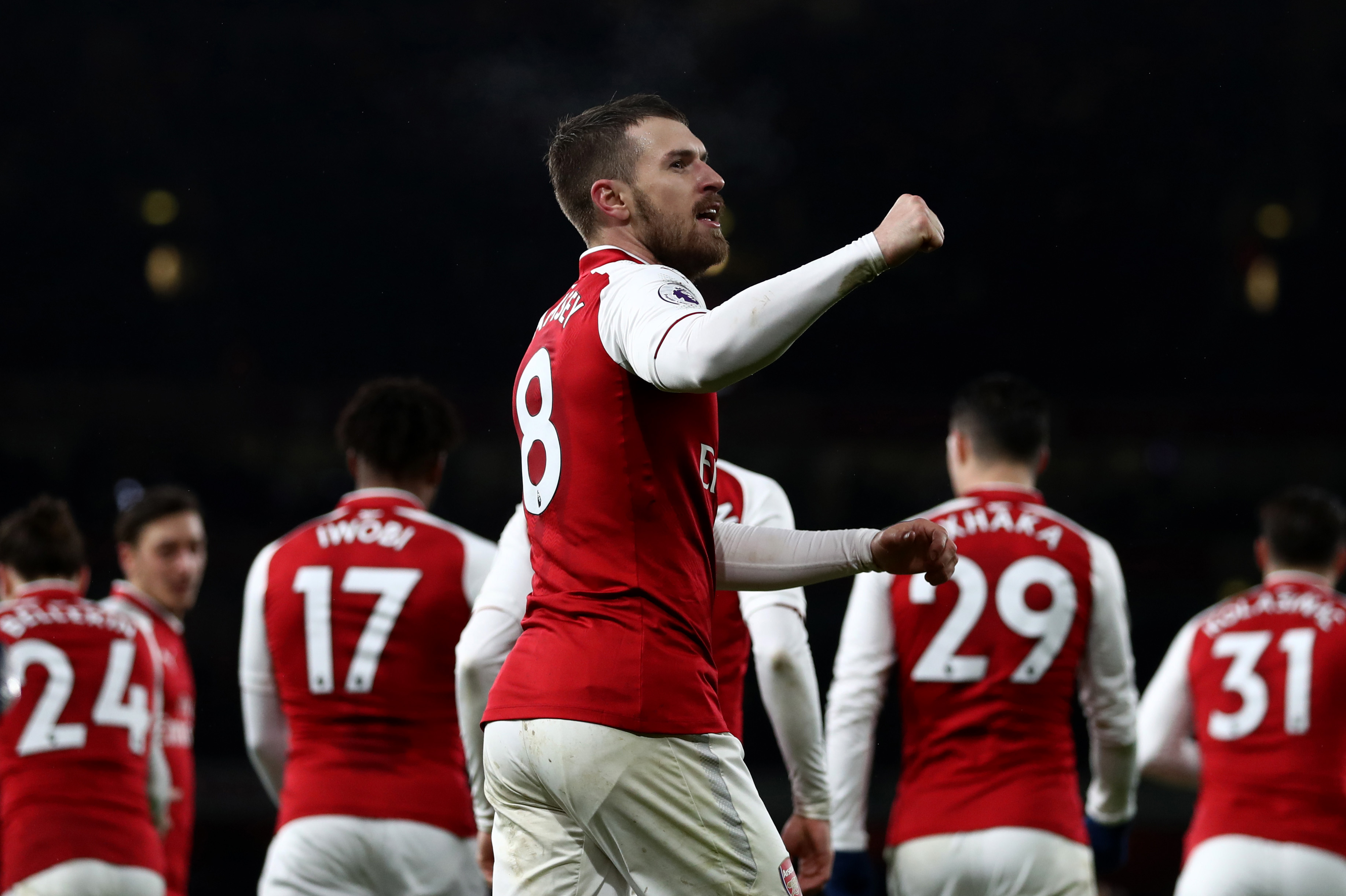 LONDON, ENGLAND - FEBRUARY 03: Aaron Ramsey of Arsenal celebrates after scoring his sides fifth goal and his hat-trick during the Premier League match between Arsenal and Everton at Emirates Stadium on February 3, 2018 in London, England. (Photo by Catherine Ivill/Getty Images)