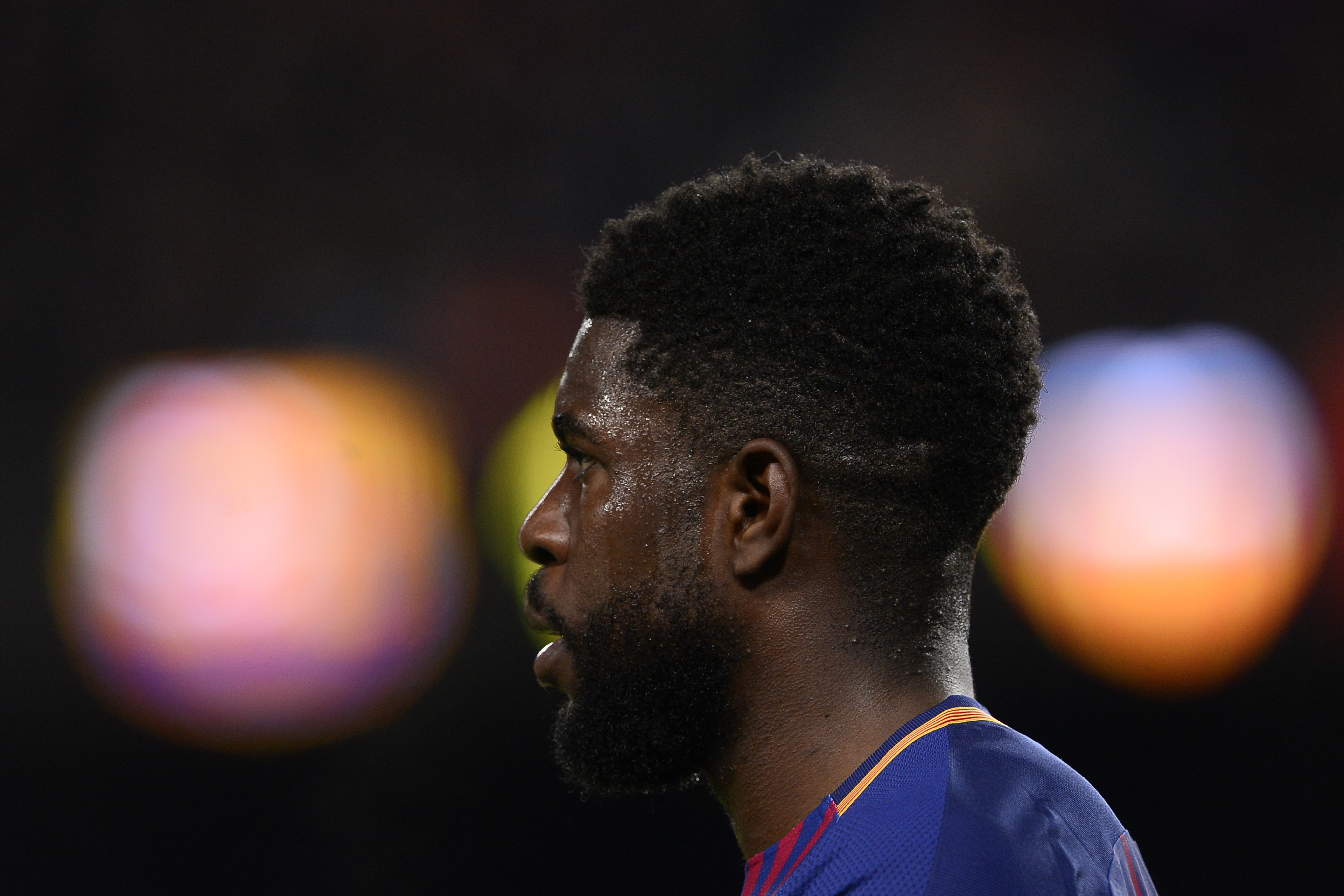 Barcelona's French defender Samuel Umtiti reacts during the Spanish 'Copa del Rey' (King's cup) first leg semi-final football match between FC Barcelona and Valencia CF at the Camp Nou stadium in Barcelona on February 01, 2018. / AFP PHOTO / Josep LAGO        (Photo credit should read JOSEP LAGO/AFP/Getty Images)