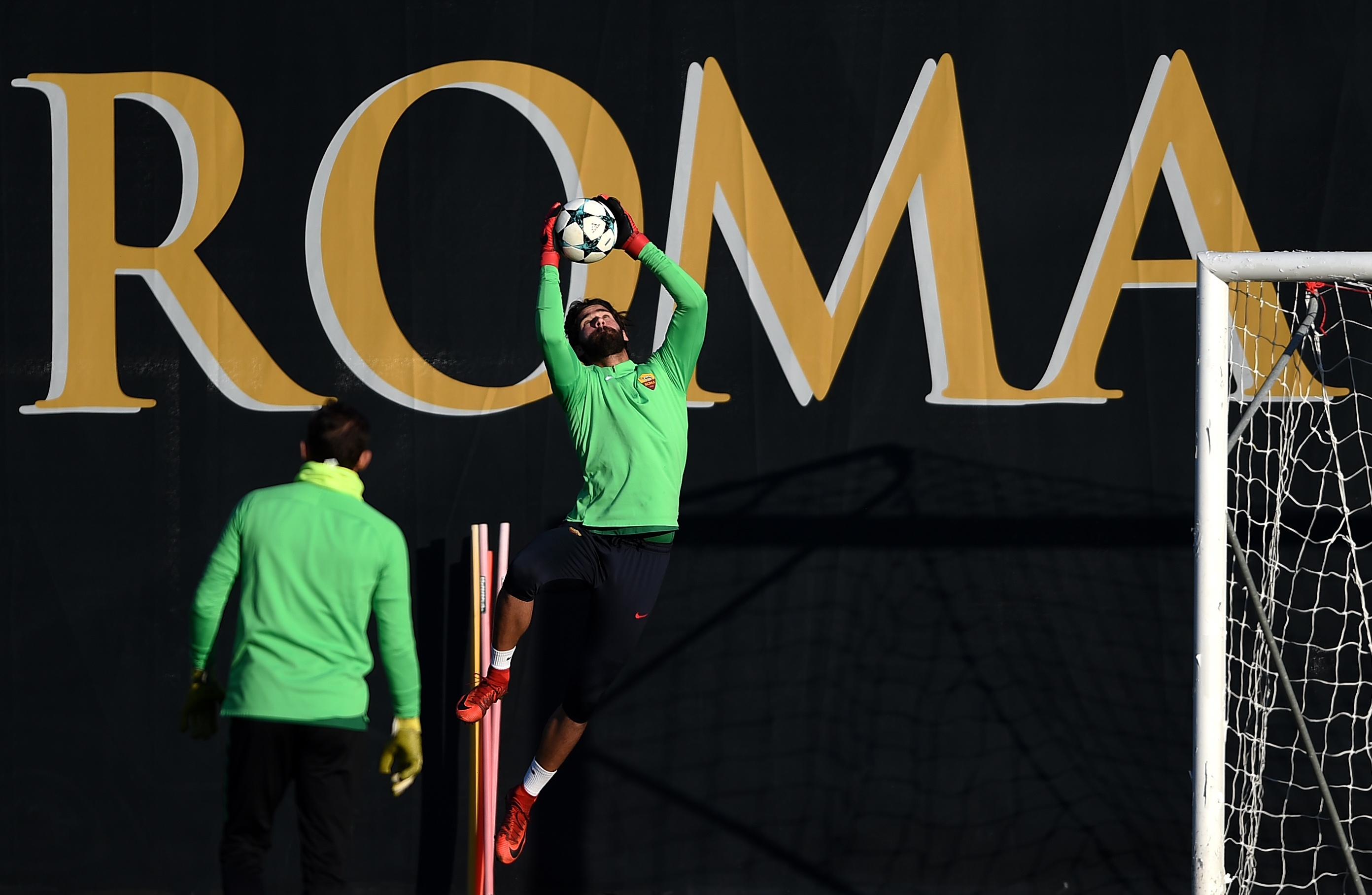 Roma's goalkeeper from Brazil Alisson take part in a training session on the eve of the UEFA Champions League football match AS Roma vs Qarabag on December 4, 2017 at Trigoria training ground near Rome.  / AFP PHOTO / FILIPPO MONTEFORTE        (Photo credit should read FILIPPO MONTEFORTE/AFP/Getty Images)
