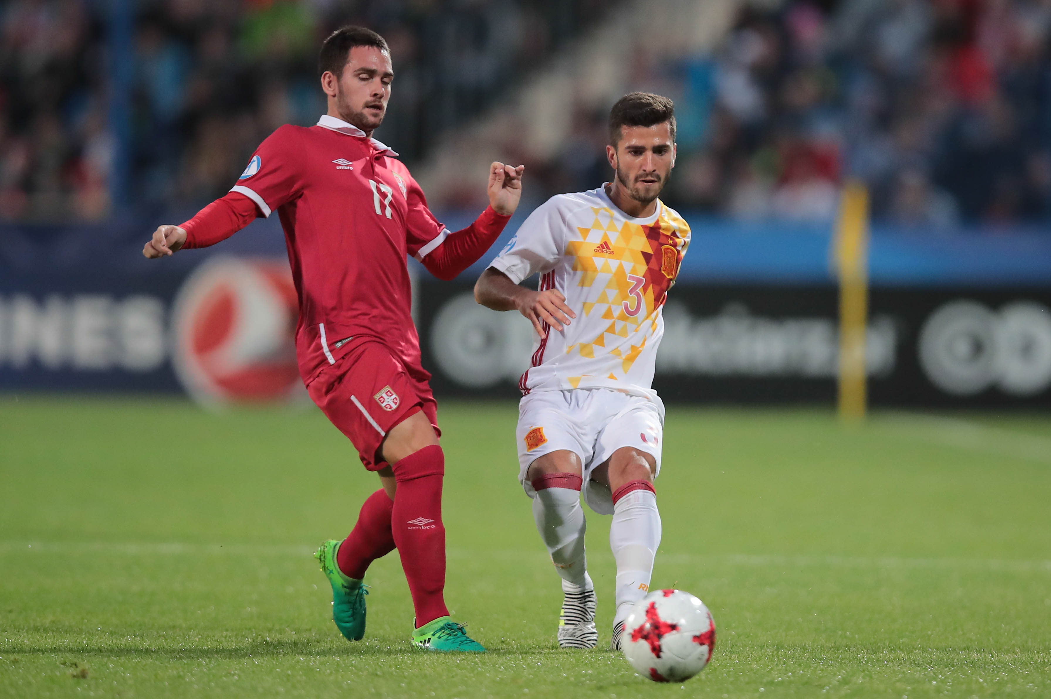 Serbia's midfielder Andrija Zivkovic (L) and Spain's defender Jose Gaya vie for the ball during the UEFA U-21 European Championship Group B football match Serbia v Spain in Bydgoszcz, Poland on June 23, 2017.  / AFP PHOTO / Roman Bosiacki        (Photo credit should read ROMAN BOSIACKI/AFP/Getty Images)