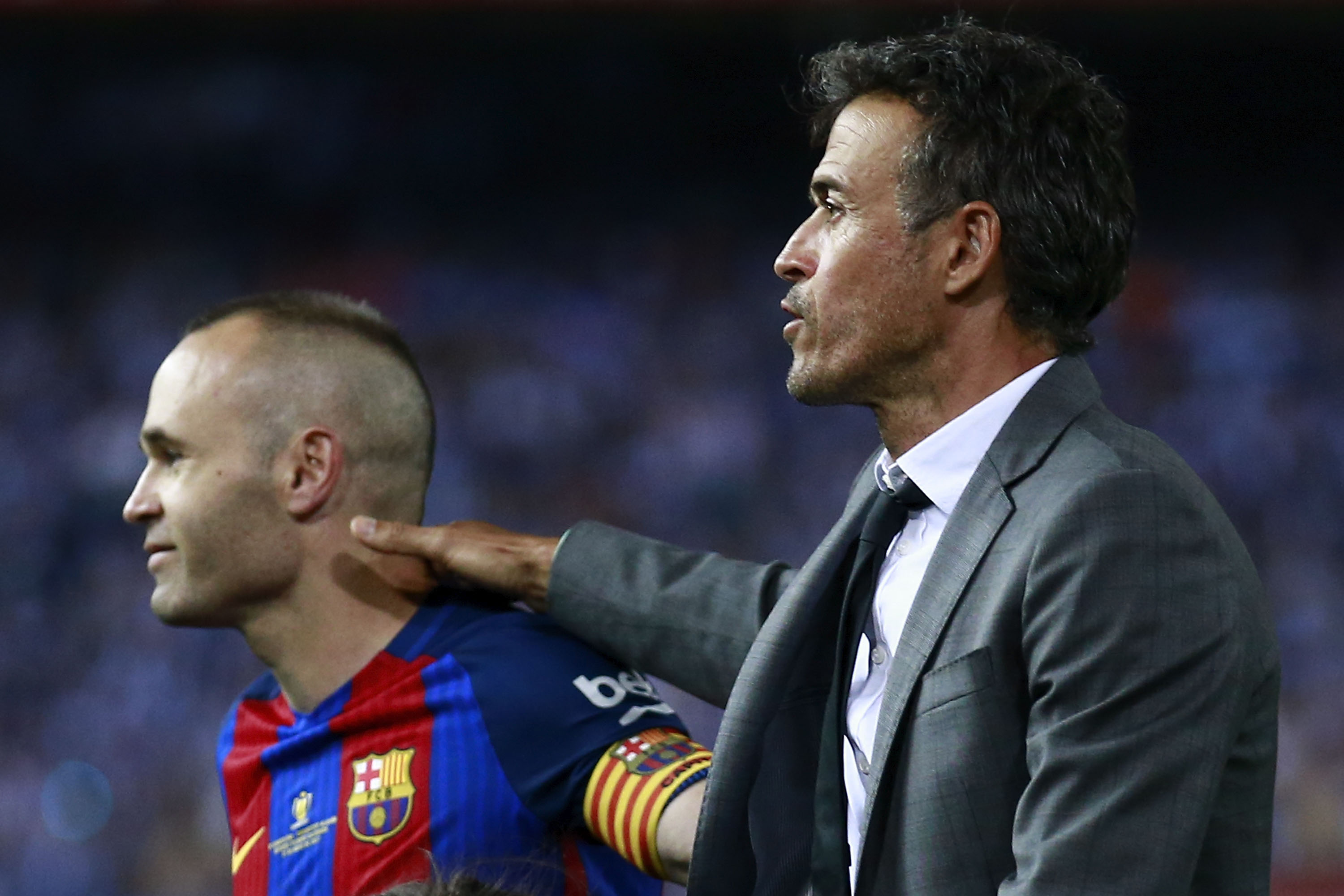 MADRID, SPAIN - MAY 27: Head coach Luis Enrique Martinez (R) of FC Barcelona hugs his captain Andres Iniesta (L) after winning the Copa Del Rey Final between FC Barcelona and Deportivo Alaves at Vicente Calderon Stadium on May 27, 2017 in Madrid, Spain.  (Photo by Gonzalo Arroyo Moreno/Getty Images)