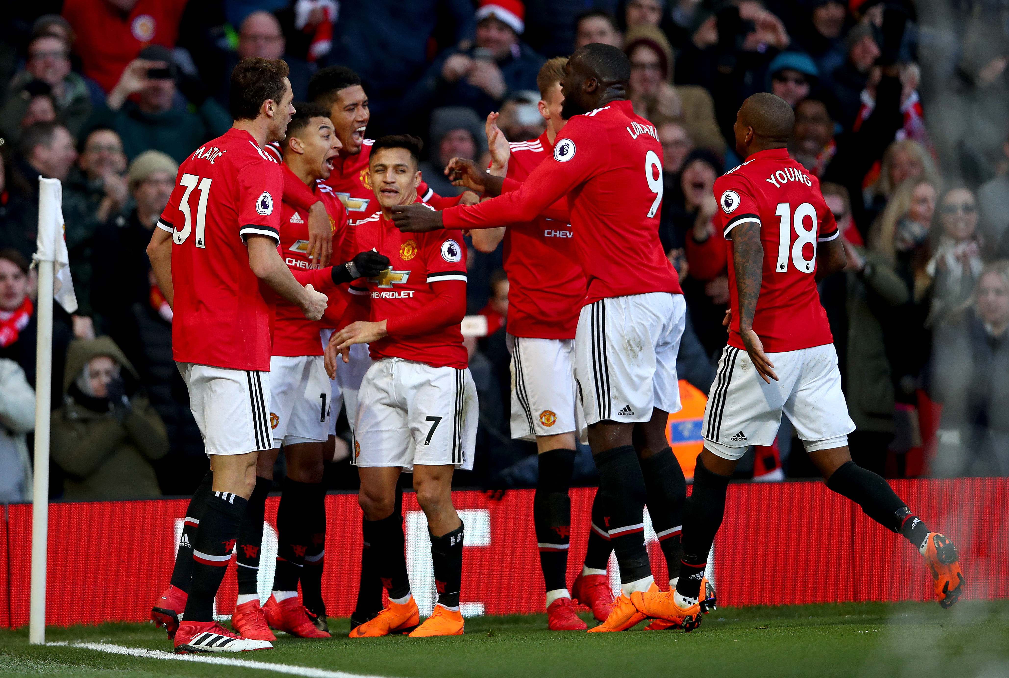 MANCHESTER, ENGLAND - FEBRUARY 25:  Jesse Lingard of Manchester United celebrates after scoring his sides second goal with team mates during the Premier League match between Manchester United and Chelsea at Old Trafford on February 25, 2018 in Manchester, England.  (Photo by Clive Brunskill/Getty Images)