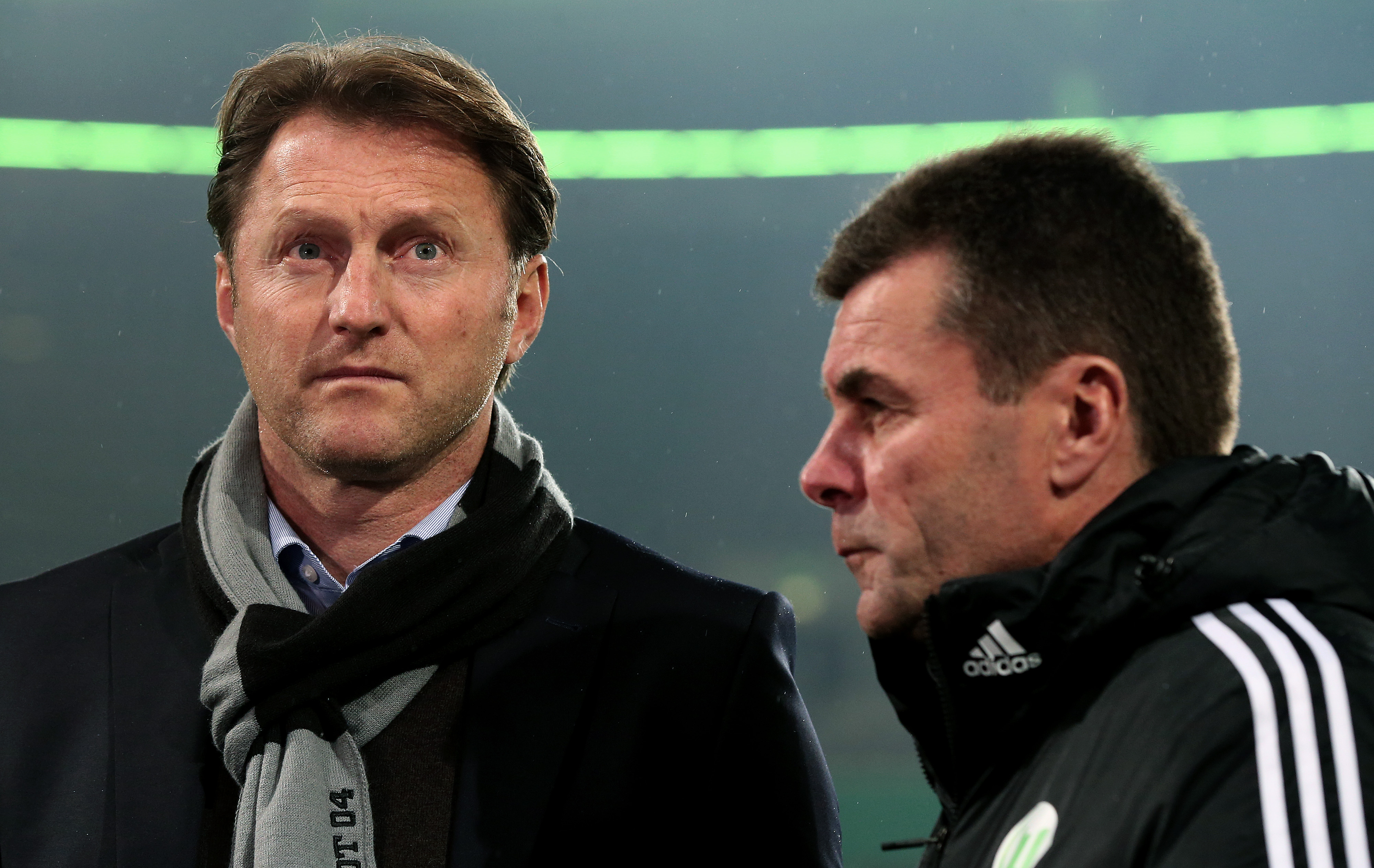 WOLFSBURG, GERMANY - DECEMBER 04:  Headcoach Ralph Hasenhuettl (L) of Ingolstadt and headcoach Dieter Hecking of Wolfsburg prior to the DFB Cup round of 16 match between VfL Wolfsburg and FC Ingolstadt at Volkswagen Arena on December 04, 2013 in Wolfsburg, Germany.  (Photo by Ronny Hartmann/Bongarts/Getty Images)