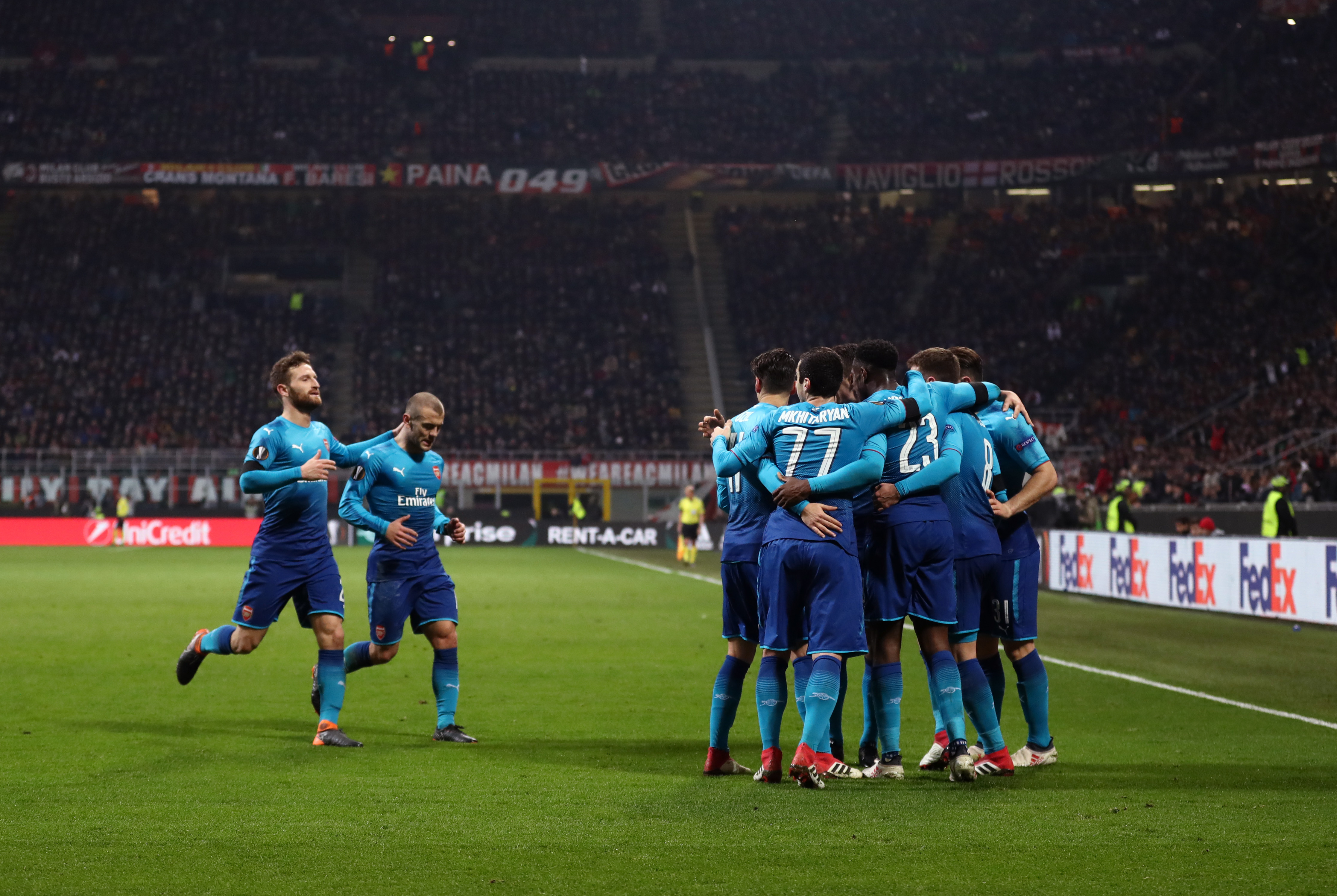 MILAN, ITALY - MARCH 08: Arsenal celebrate after scoring a goal during the UEFA Europa League Round of 16 match between AC Milan and Arsenal at the San Siro on March 8, 2018 in Milan, Italy. (Photo by Catherine Ivill/Getty Images)