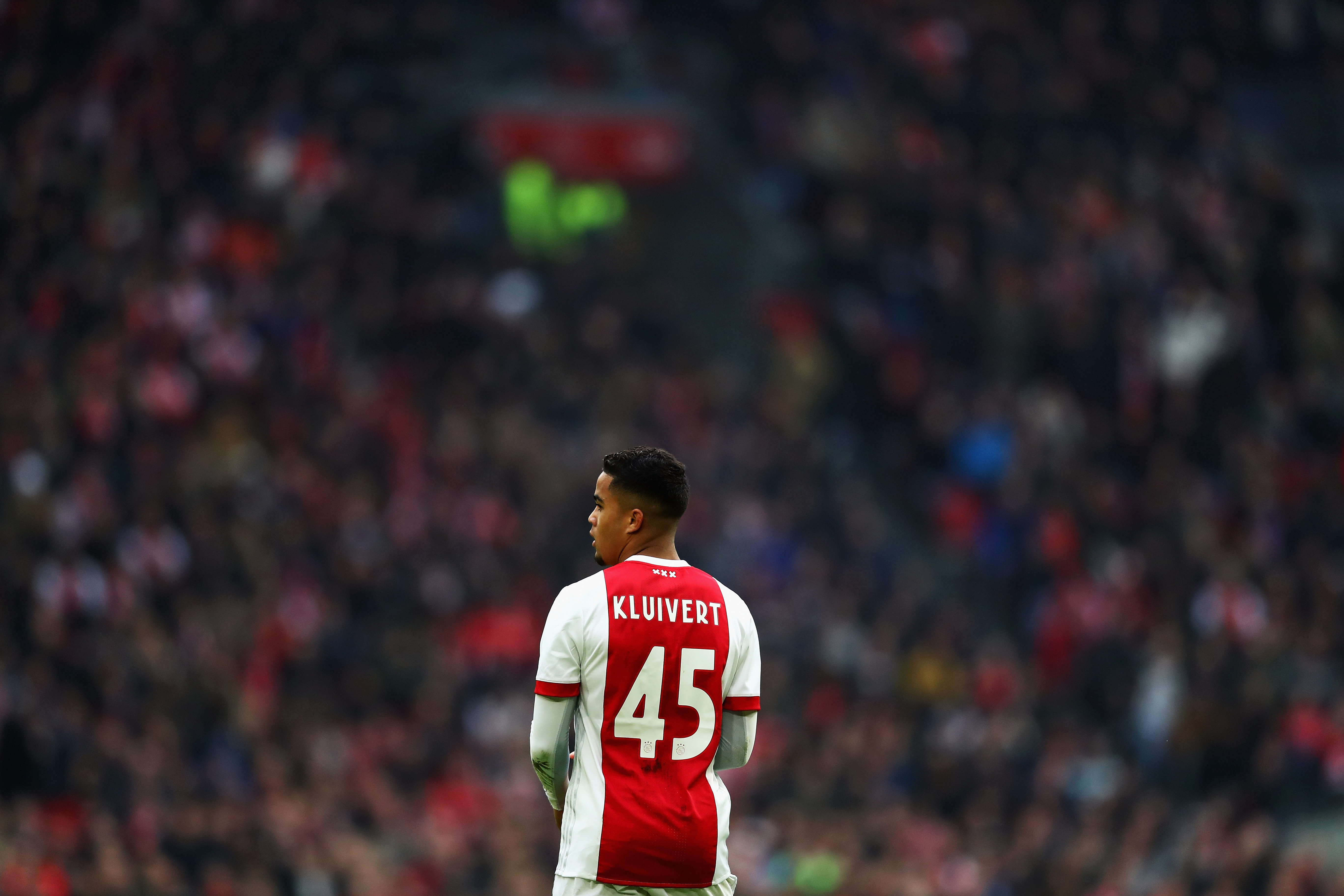 AMSTERDAM, NETHERLANDS - JANUARY 21:  Justin Kluivert of Ajax in action during the Dutch Eredivisie match between Ajax Amsterdam and Feyenoord at Amsterdam ArenA on January 21, 2018 in Amsterdam, Netherlands.  (Photo by Dean Mouhtaropoulos/Getty Images)