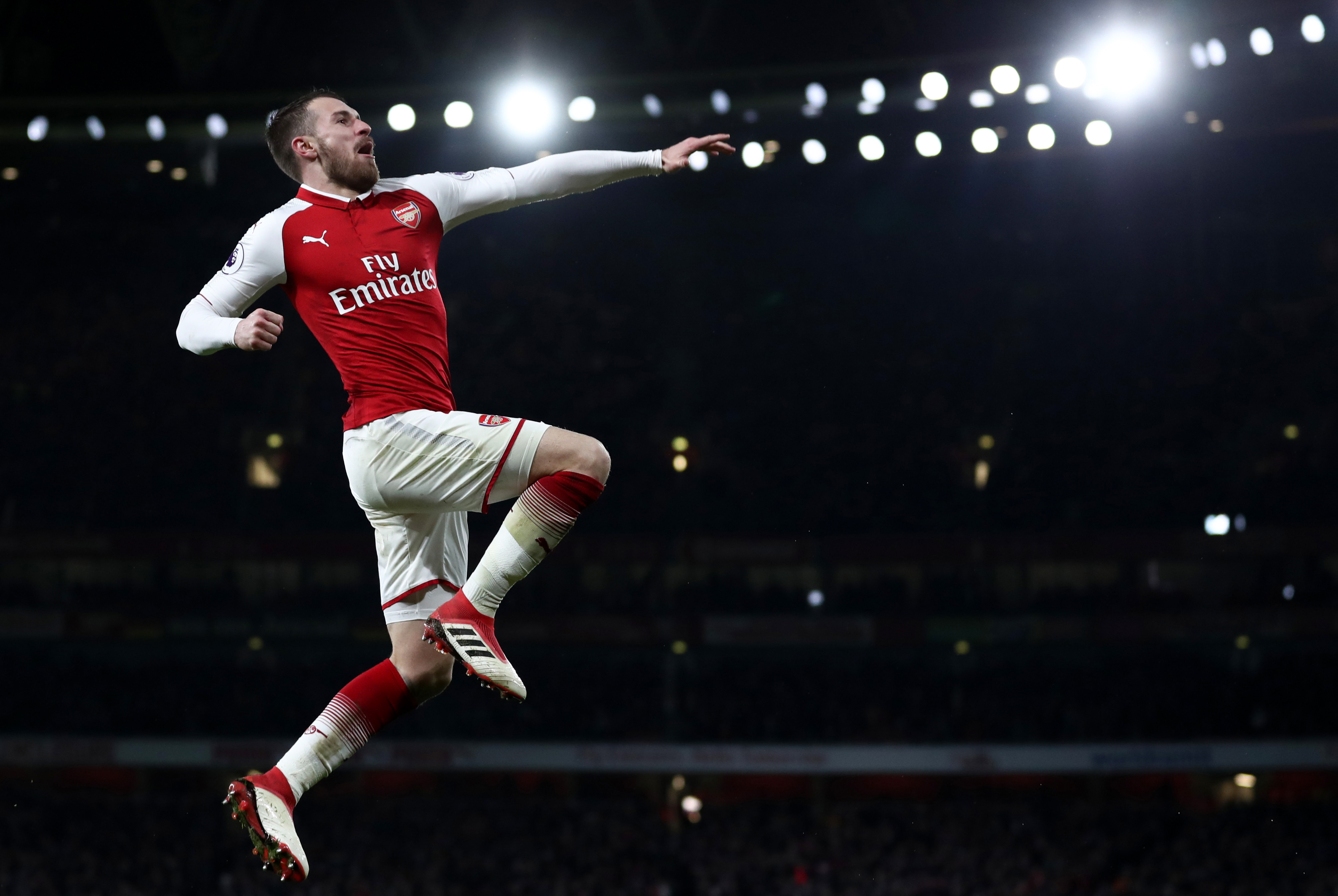 LONDON, ENGLAND - FEBRUARY 03:  Aaron Ramsey of Arsenal celebrates after scoring his sides fifth goal and his hat-trick during the Premier League match between Arsenal and Everton at Emirates Stadium on February 3, 2018 in London, England. (Photo by Catherine Ivill/Getty Images)